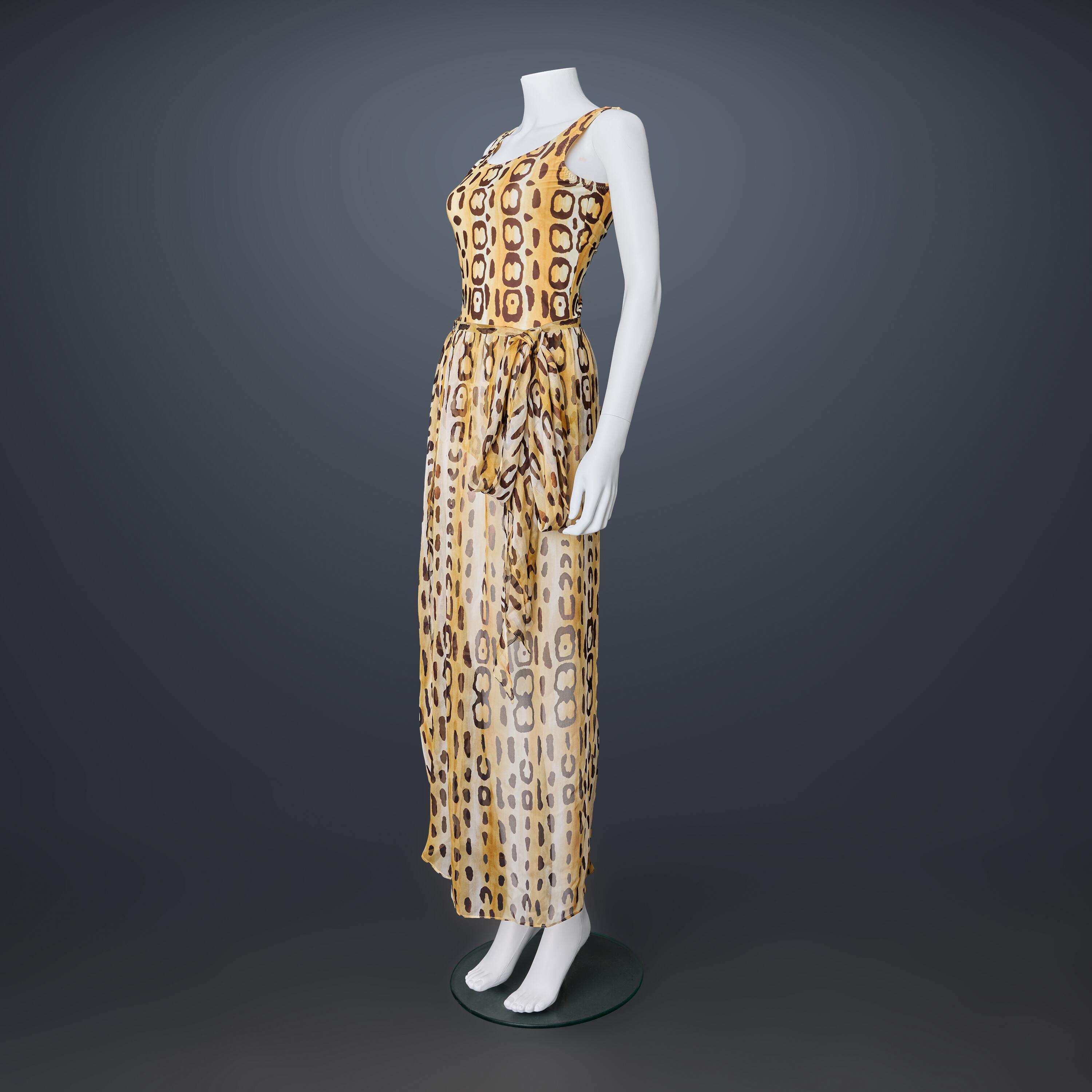 The leopard-print, screen-used, bathing costume and matching sarong worn by actress, Elizabeth Debicki, for her portrayal of Diana, Princess of Wales, in Season 5, Episode 1 of the The Crown "Queen Victoria Syndrome" - available to rent or exhibit from Kudos Memorabilia, UK