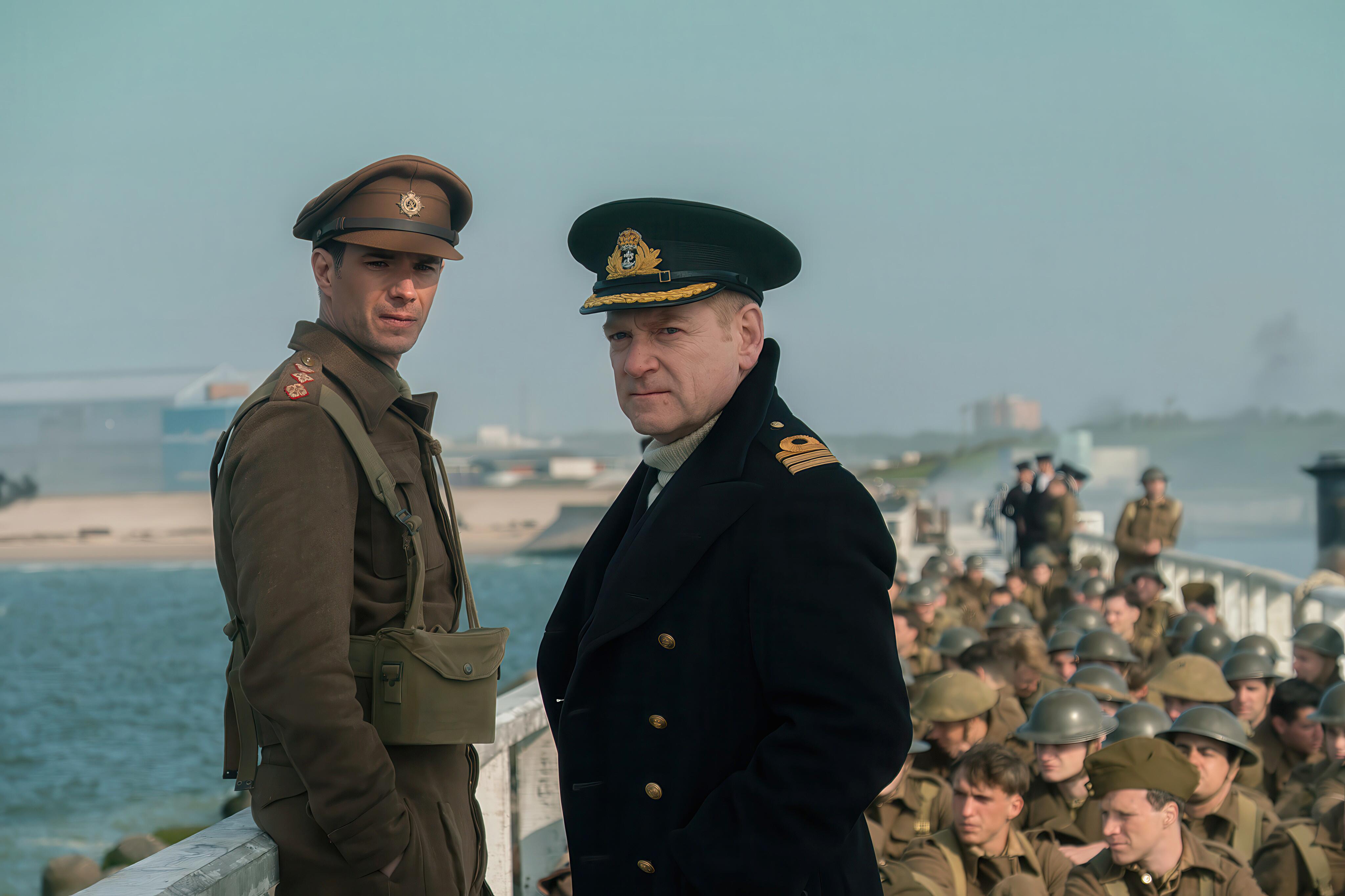 Dunkirk The Movie (2017), directed by Christopher Nolan. Actors kenneth Branagh and James D'Arcy stand on The Mole