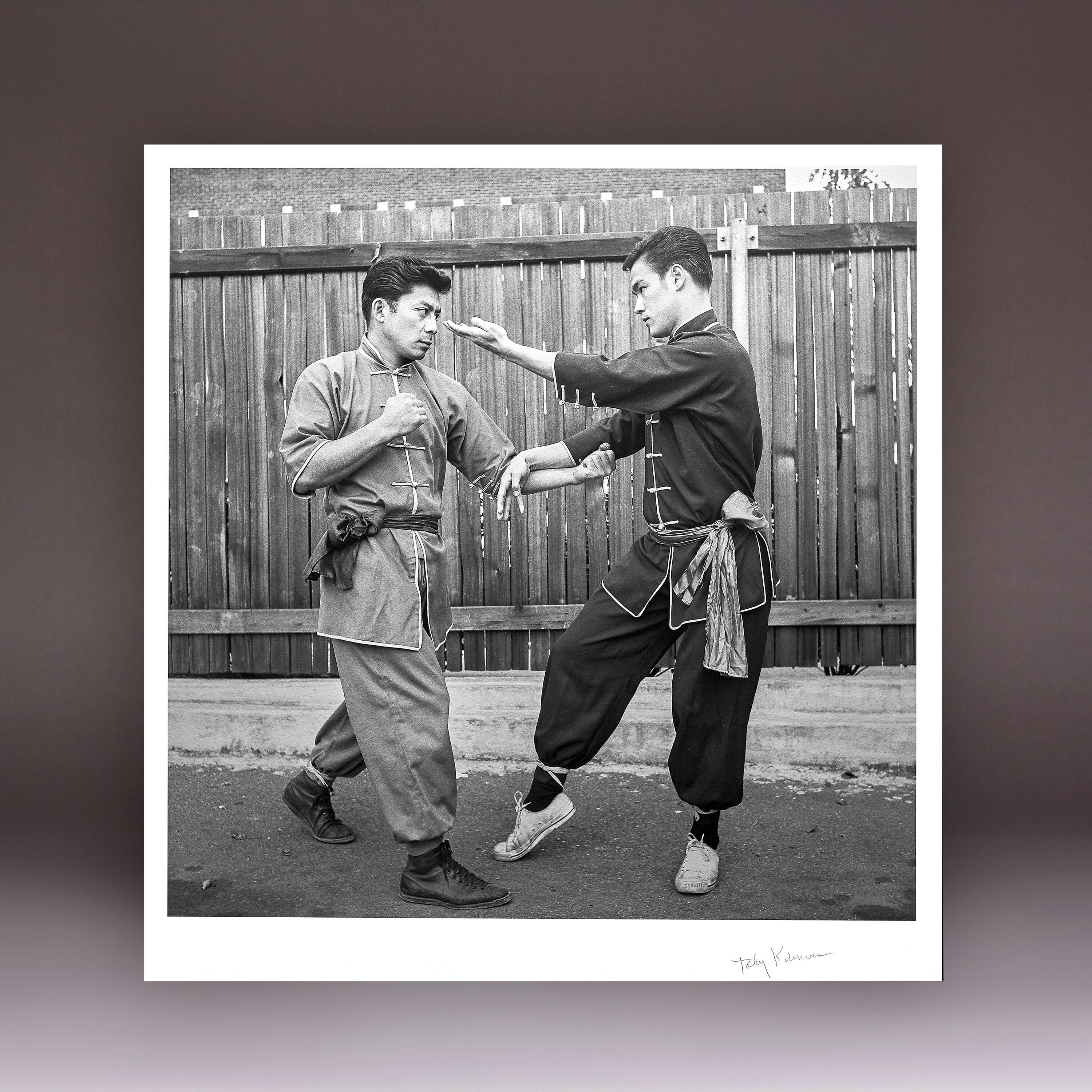 Bruce Lee and Taky Kimura signed fine art print; 1963 black and white photo of Wing Chun Hueng Sao with Bil Jee.