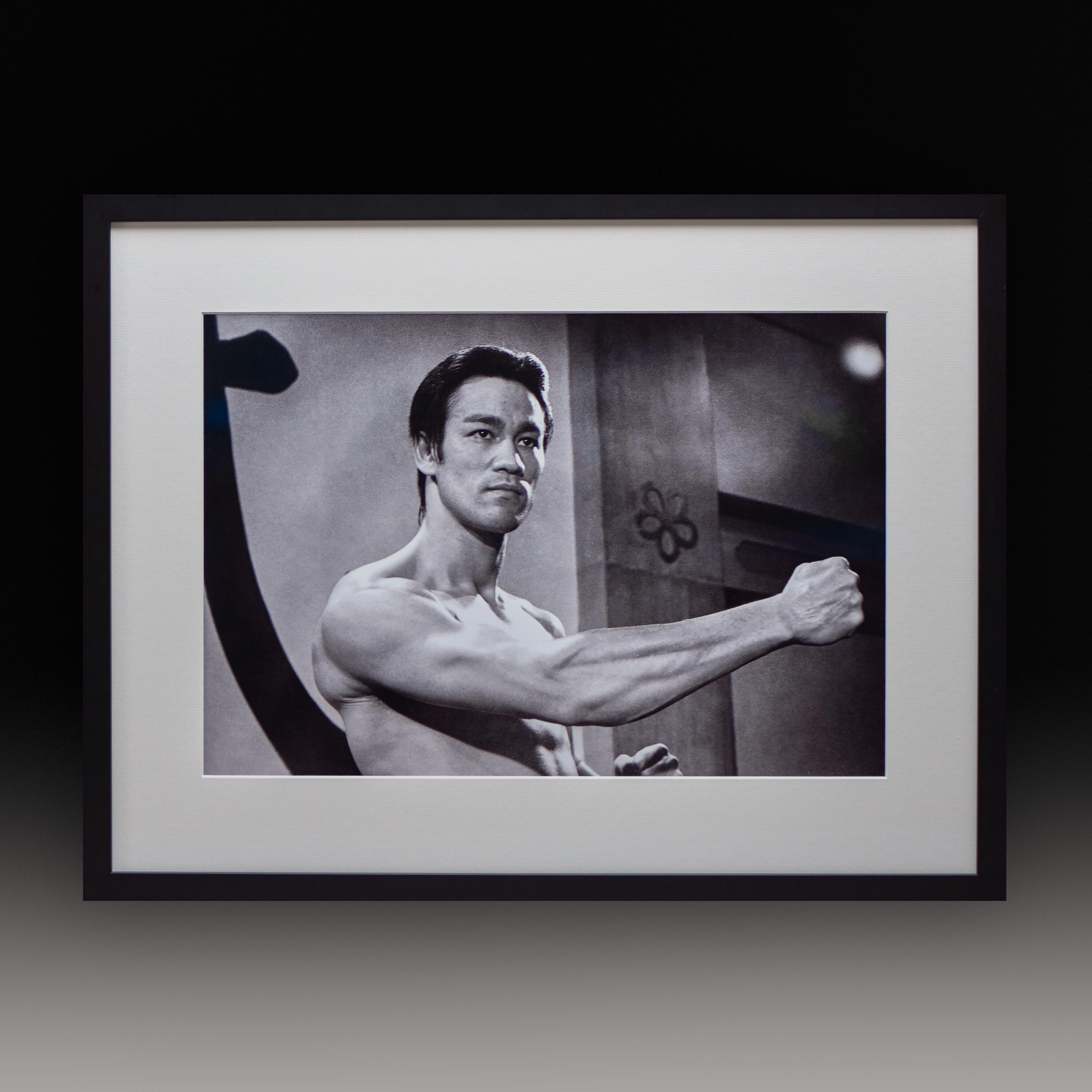 A stunning 20 x 14" exhibition print showcasing a dynamic fist pose from the publicity shoot for 'Fist of Fury'. Available from Kudos Memorabilia.com