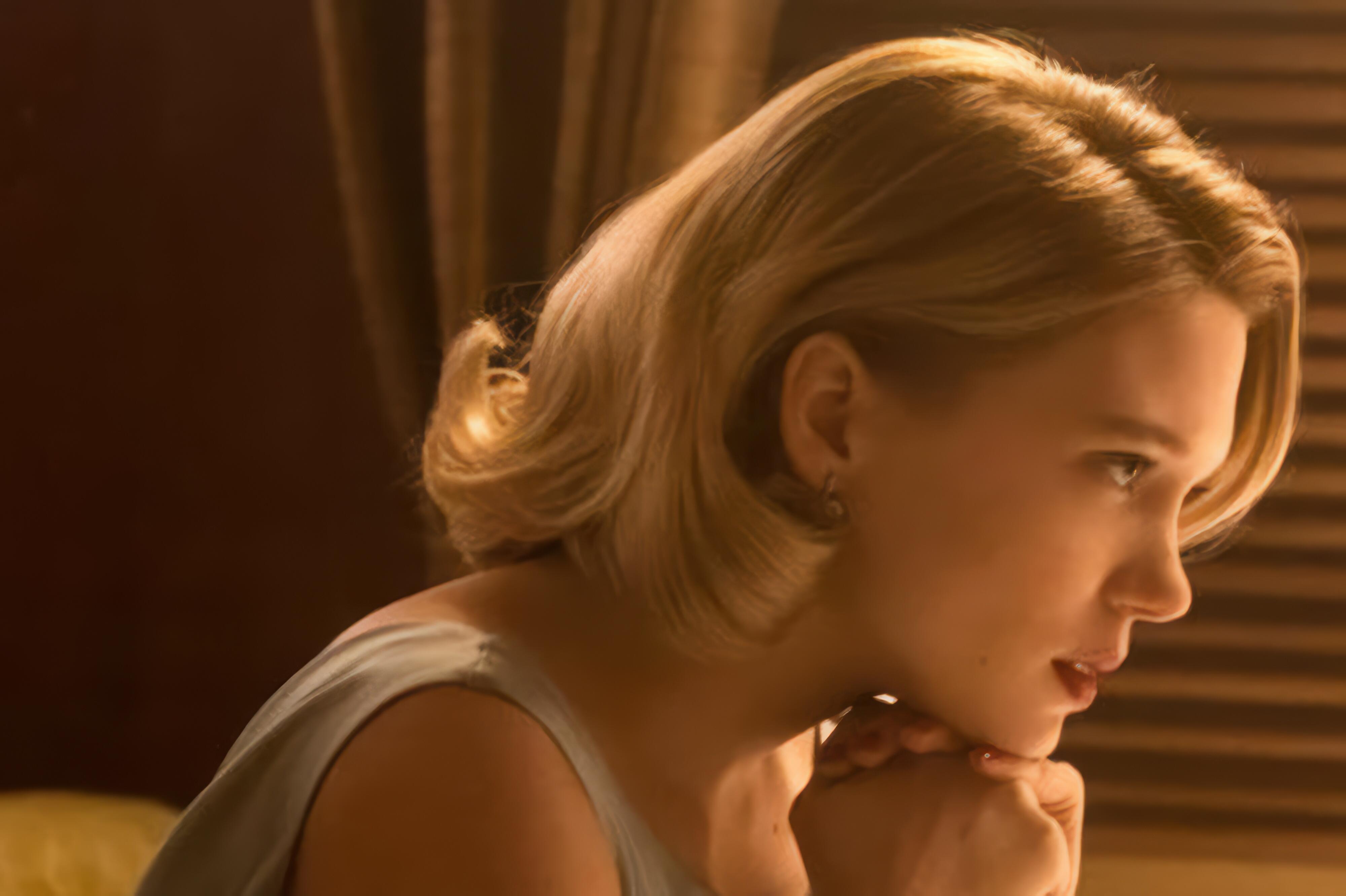 Madeleine Swann (Léa Seydoux) in a quiet, emotional moment from Spectre, highlighting the depth of her character's connection to Bond.