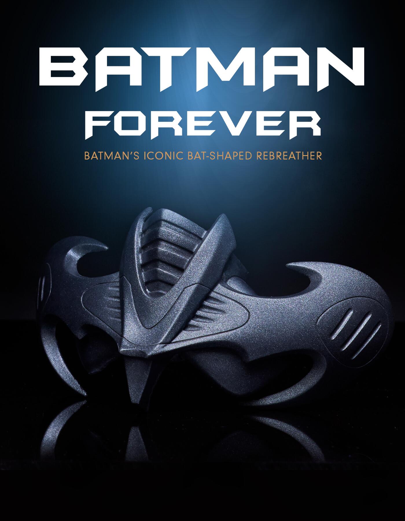 Batman's Iconic Bat-Shaped Breather. Close up image on a black background with the title text 'Batman Forever'