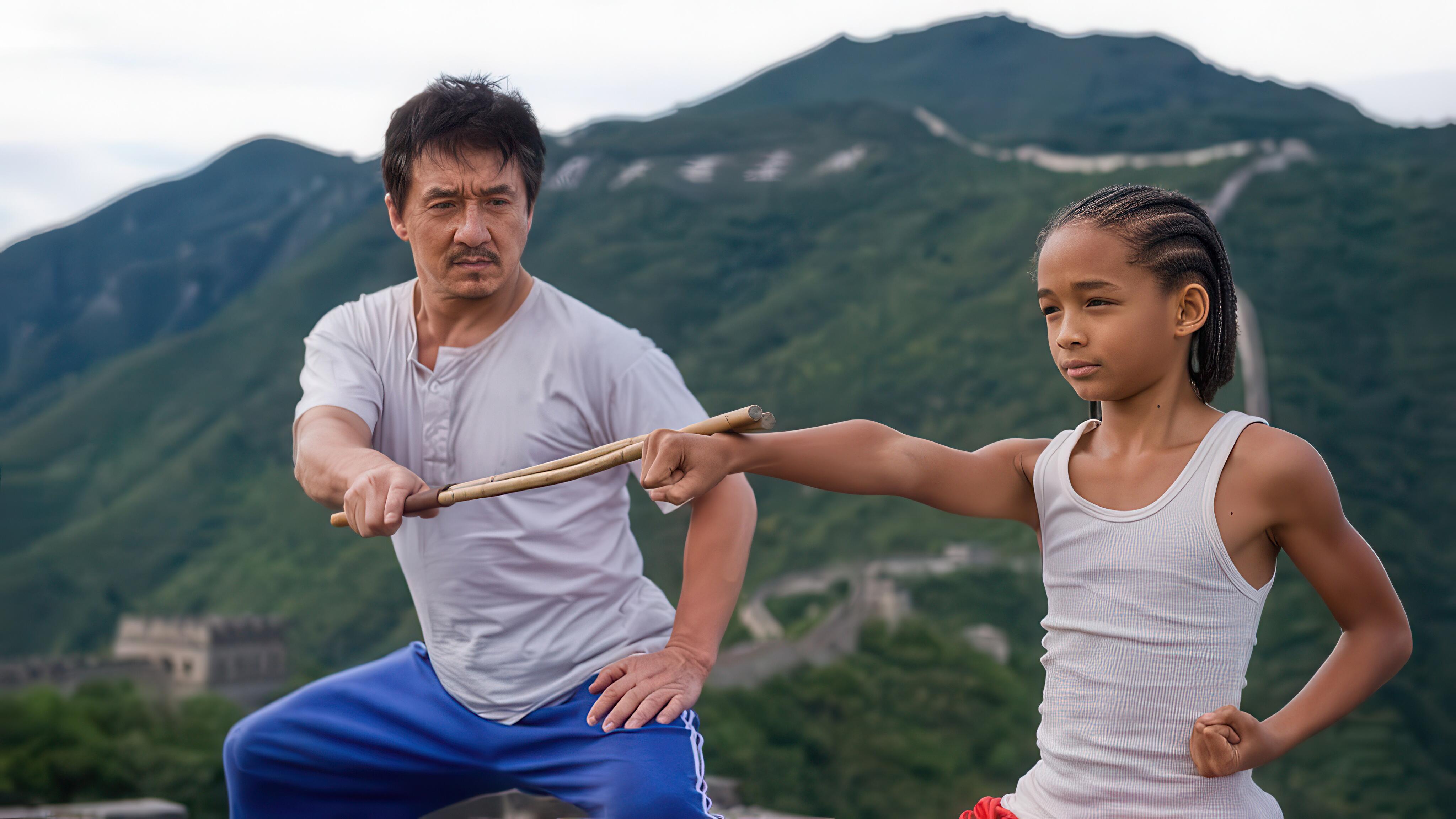 Jackie Chan coaching a young Jaden Smith in 'The Karate Kid' (2010)