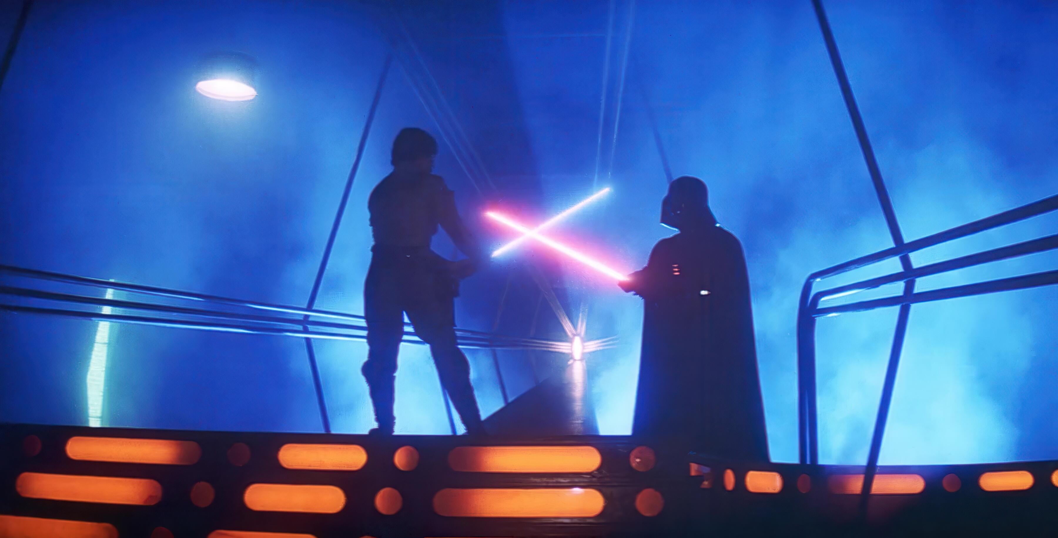 Luke Skywalker and Darth Vader facing off in their epic lightsaber battle at the end of The Empire Strikes Back