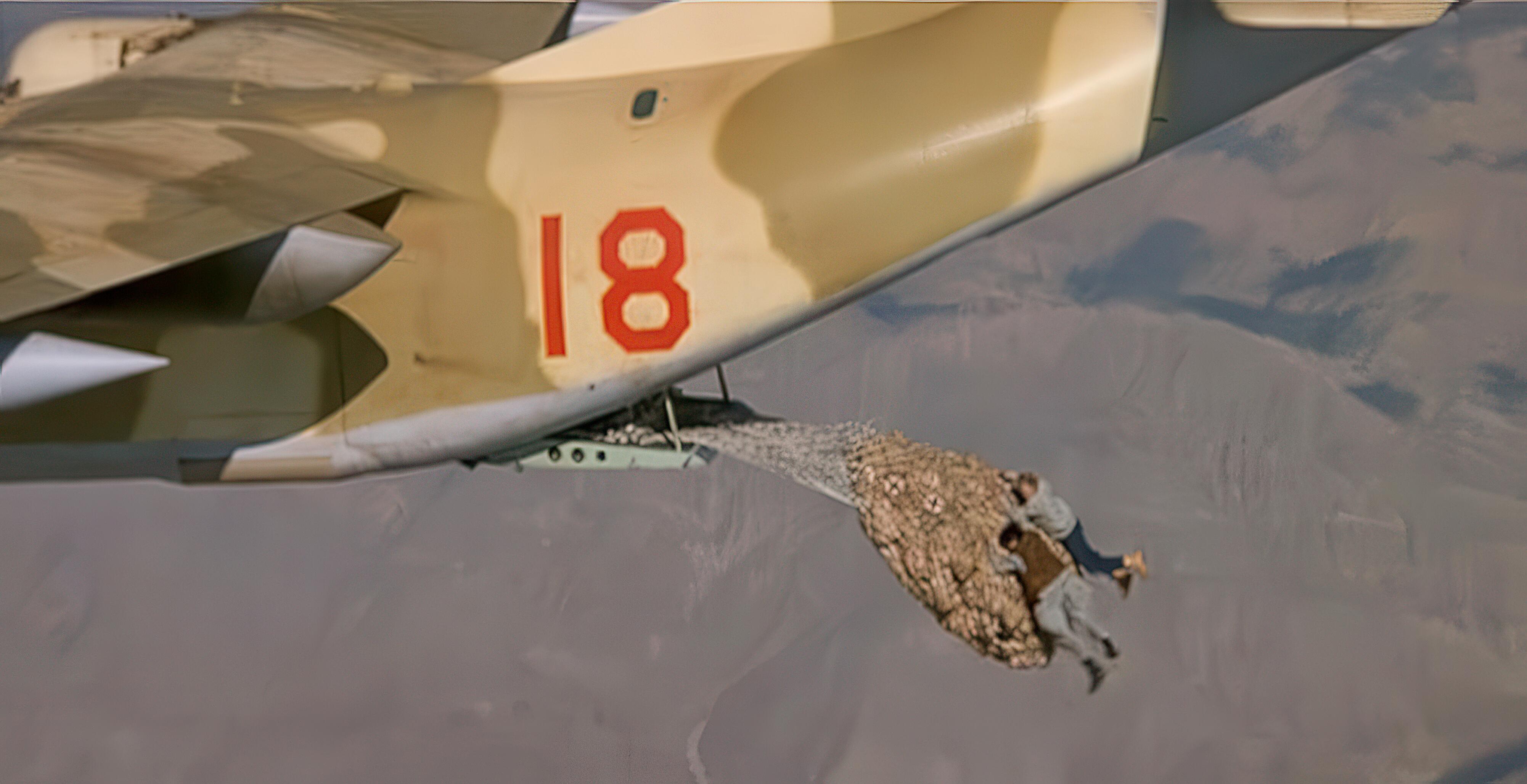 Freefall legends and stuntmen, BJ Worth and Jake Lombard, hanging off a cargo net attached to a Lockheed C-130 Hercules. The sequence was one of the daring and dangerous in the ‘The Living Daylights’, Timothy Dalton’s debut movie as James Bond, 007.