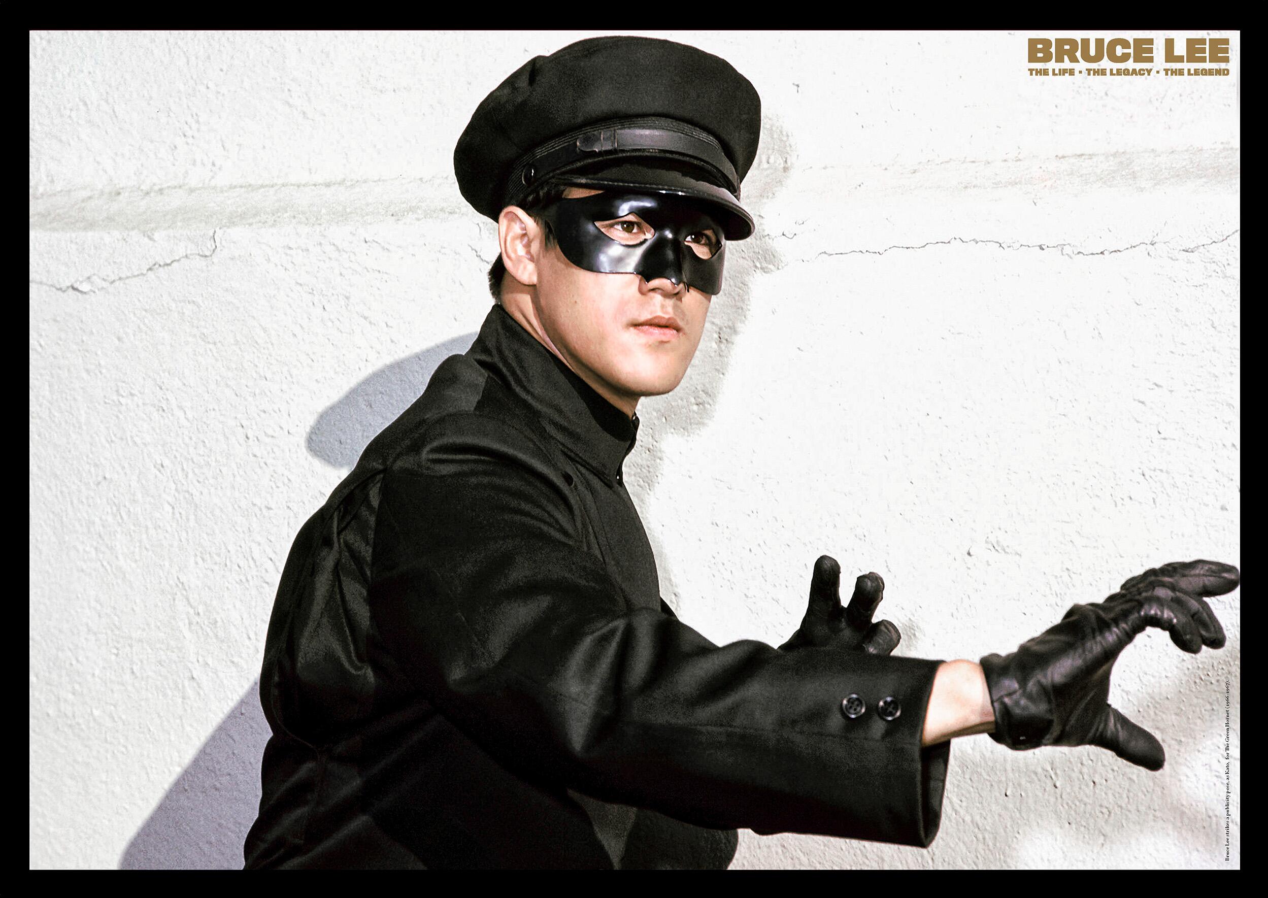  A glossy A1 poster of Bruce Lee, dressed as Kato, The Green Hornet's butler and fellow crime-figher