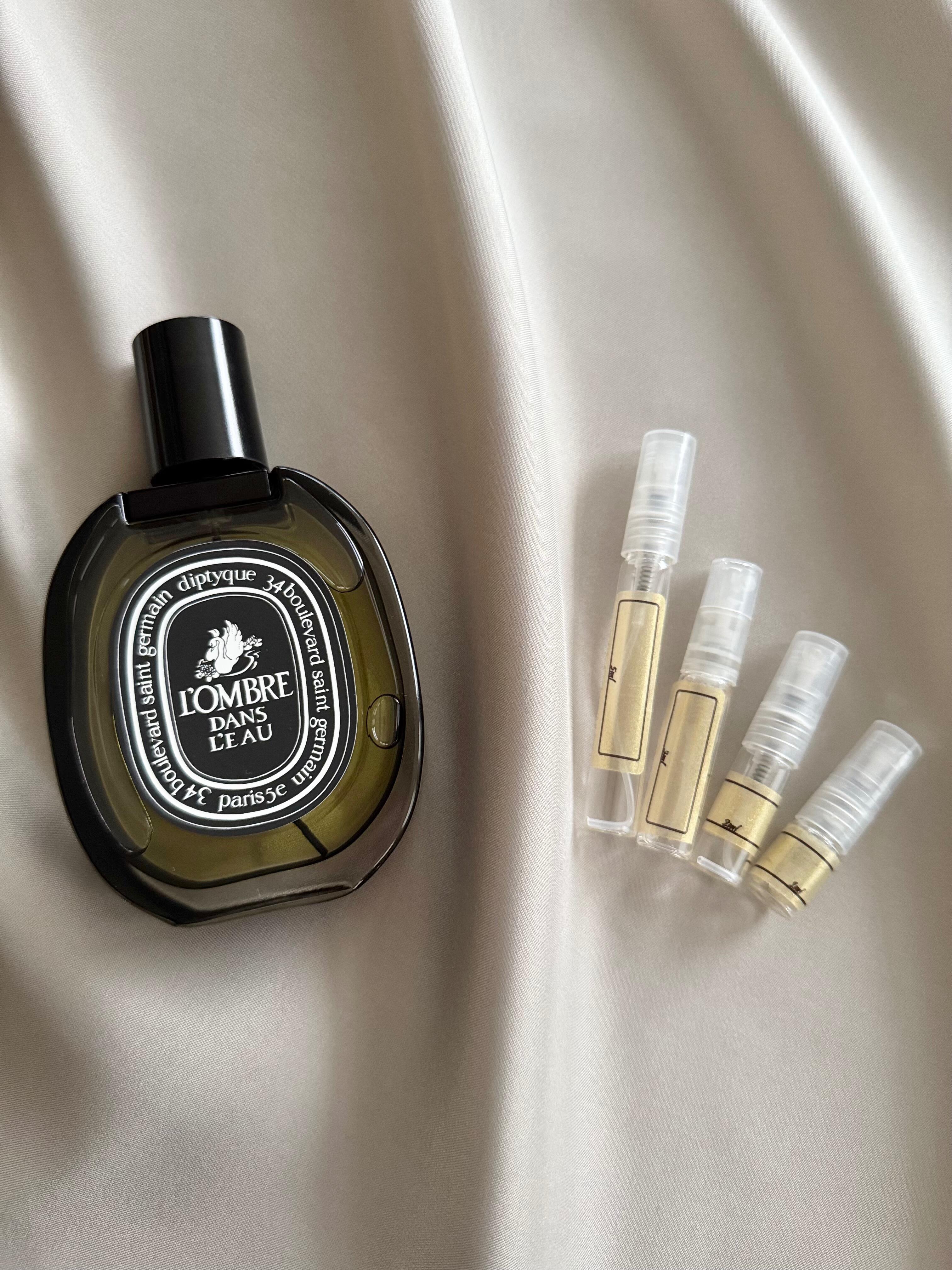 Diptyque L'Ombre Dans L'Eau perfume with sample bottles