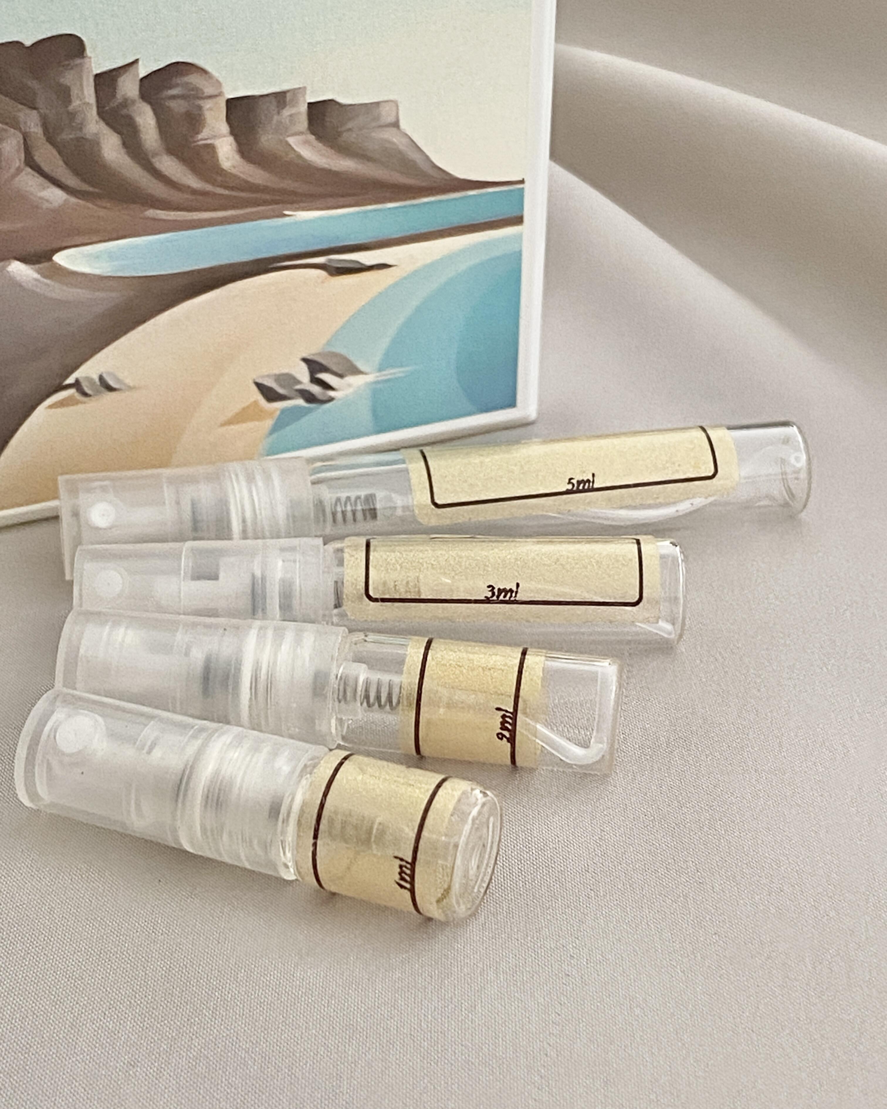 Adamo Parfum Clifton bottle and sample bottles
