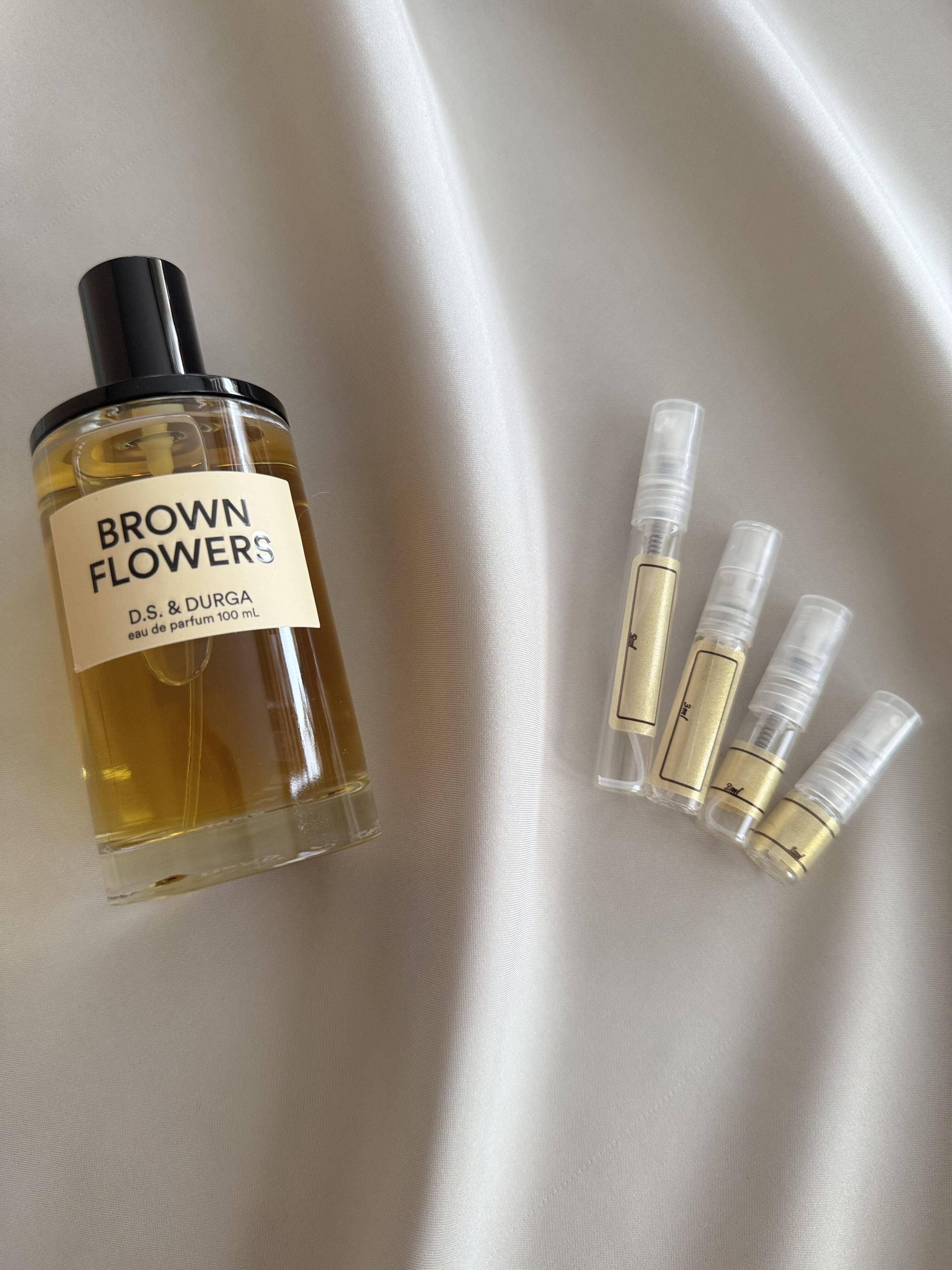 D S & Durga Brown Flowers with sample bottles