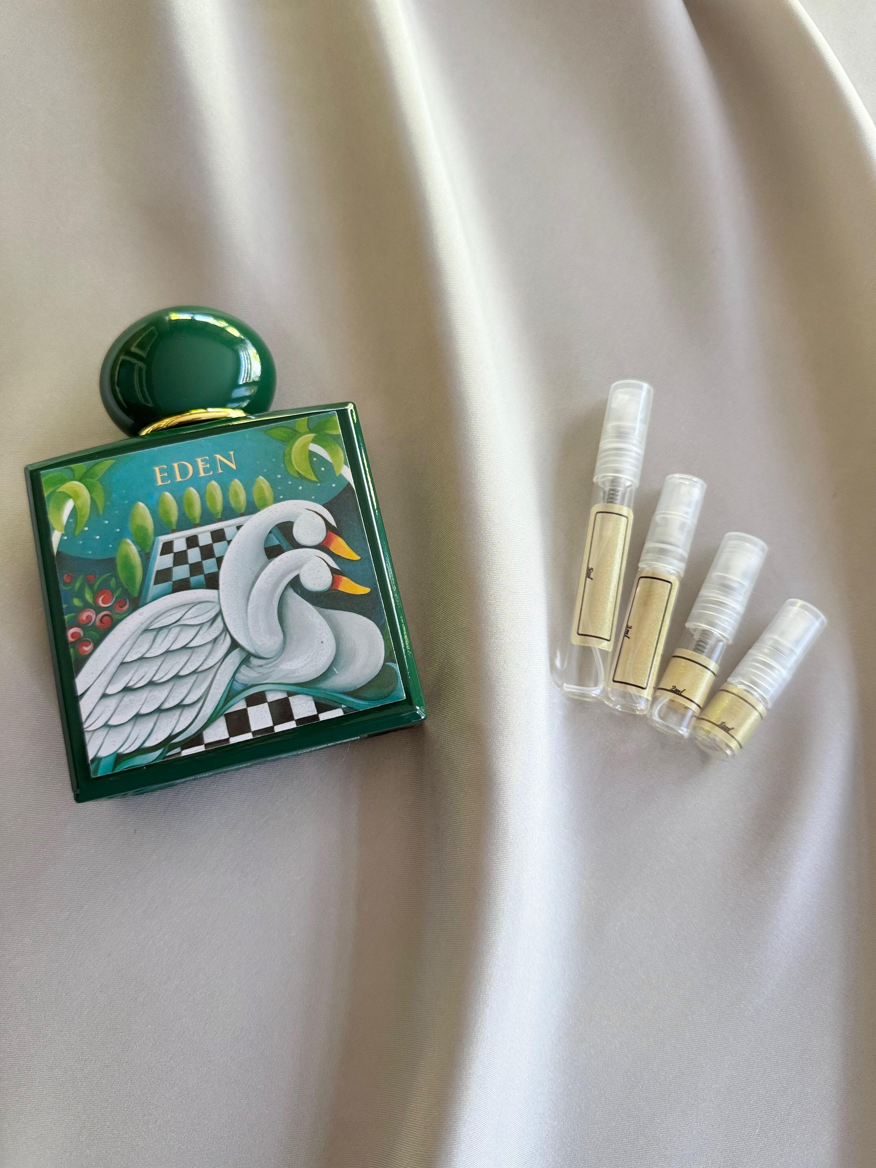 Adamo Parfum Eden with sample bottles