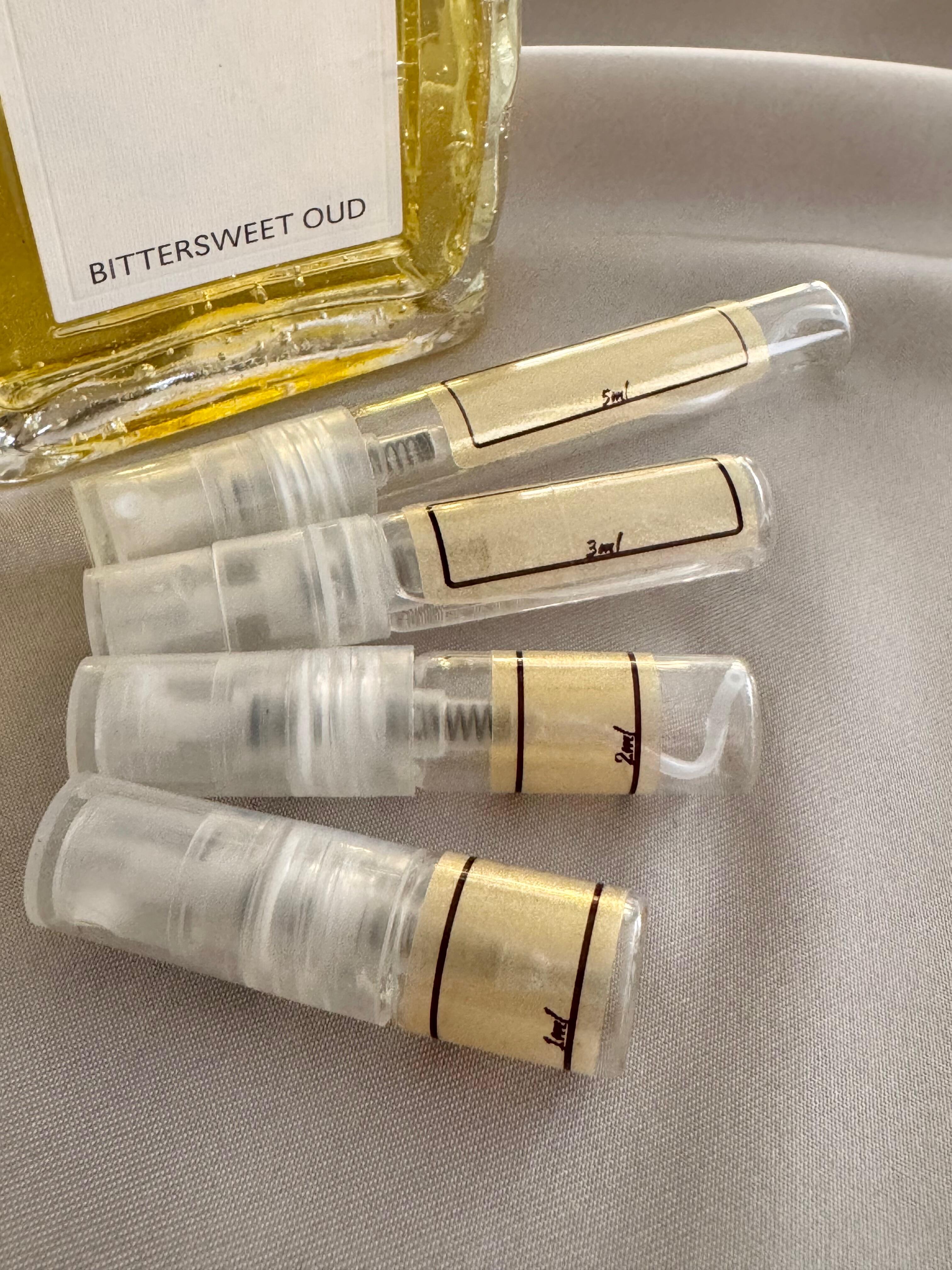 Loewe Bittersweet Oud with sample bottles