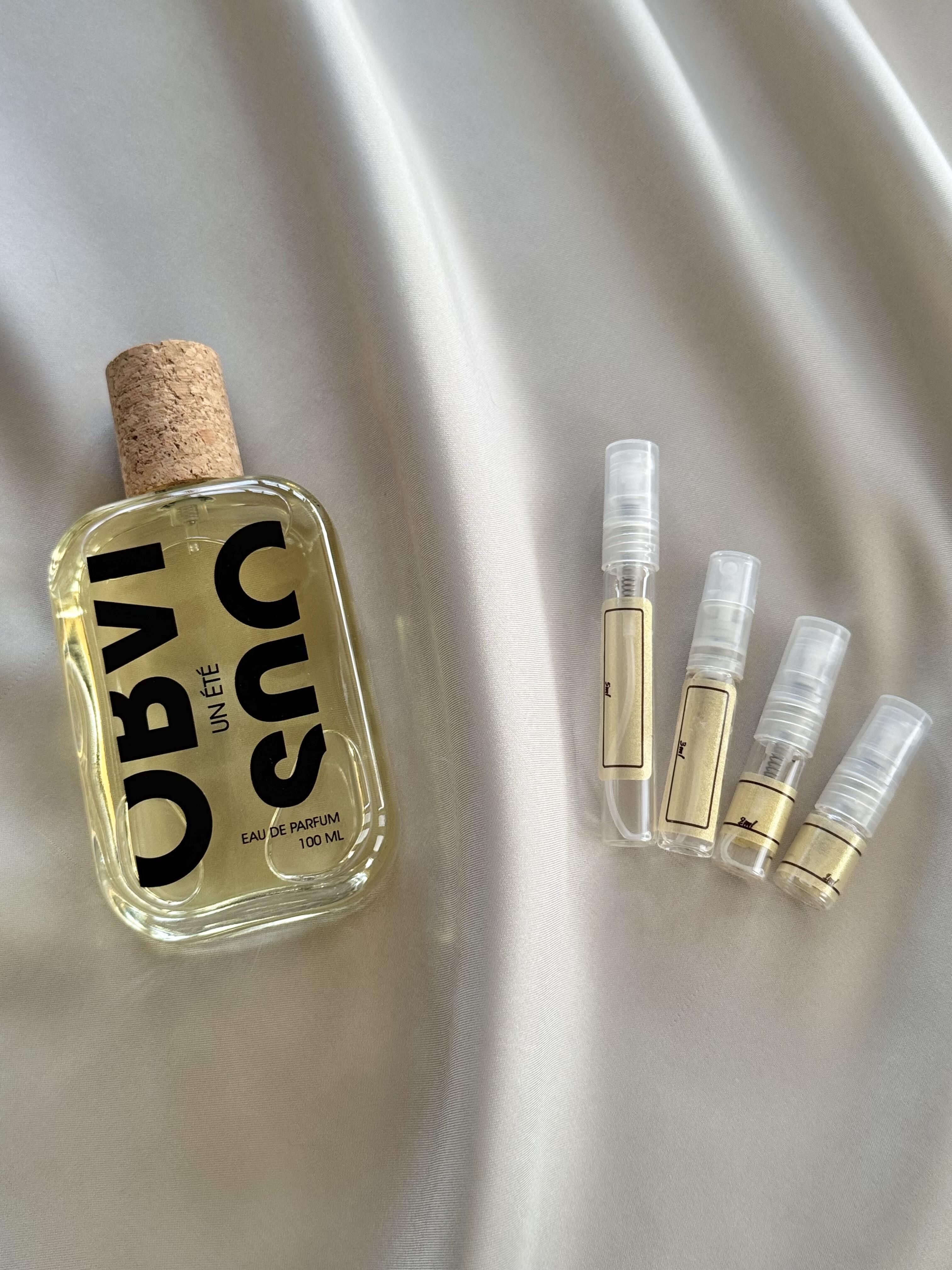 Obvious Parfums Une Ete with sample bottles