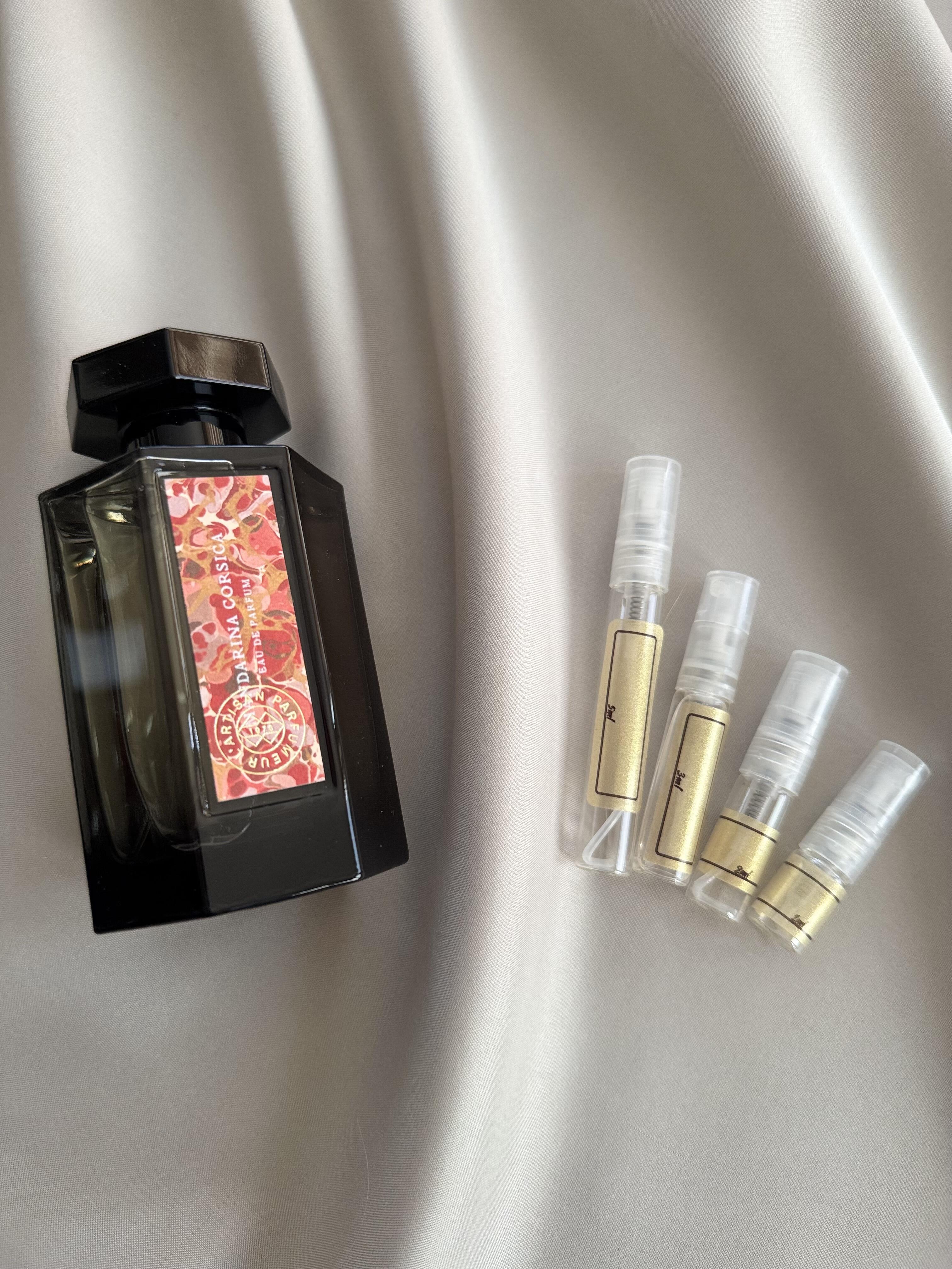L'Artisan Parfumeur Mandarina Corsica perfume bottle with samples