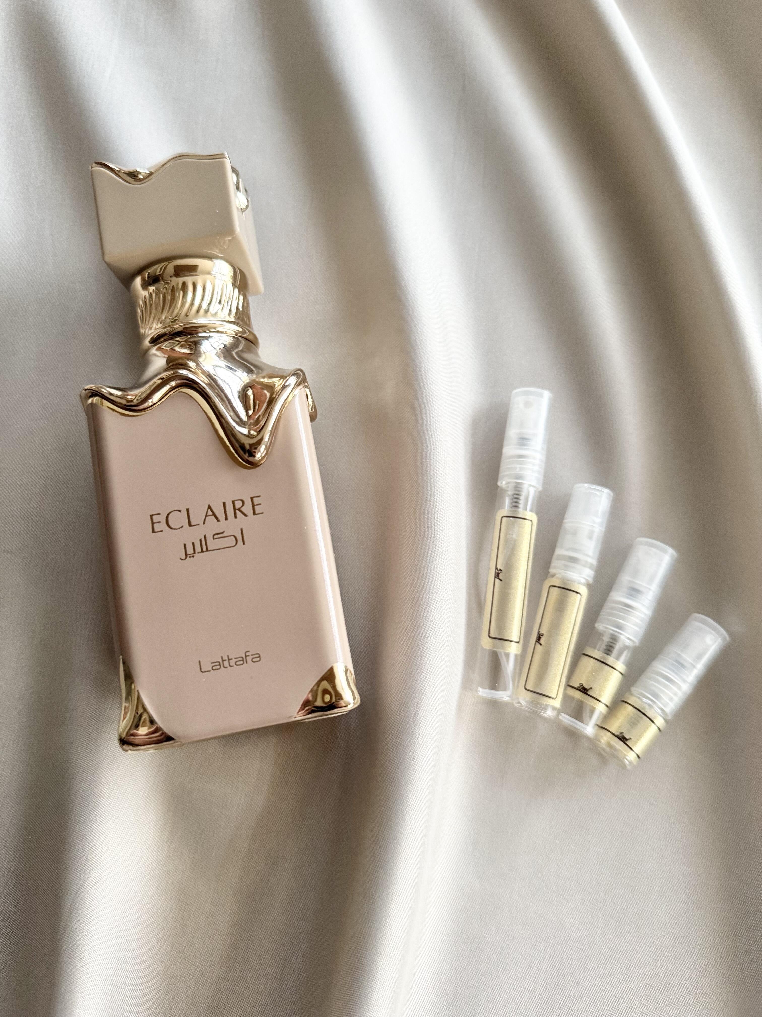 Lattafa Eclaire with sample bottles