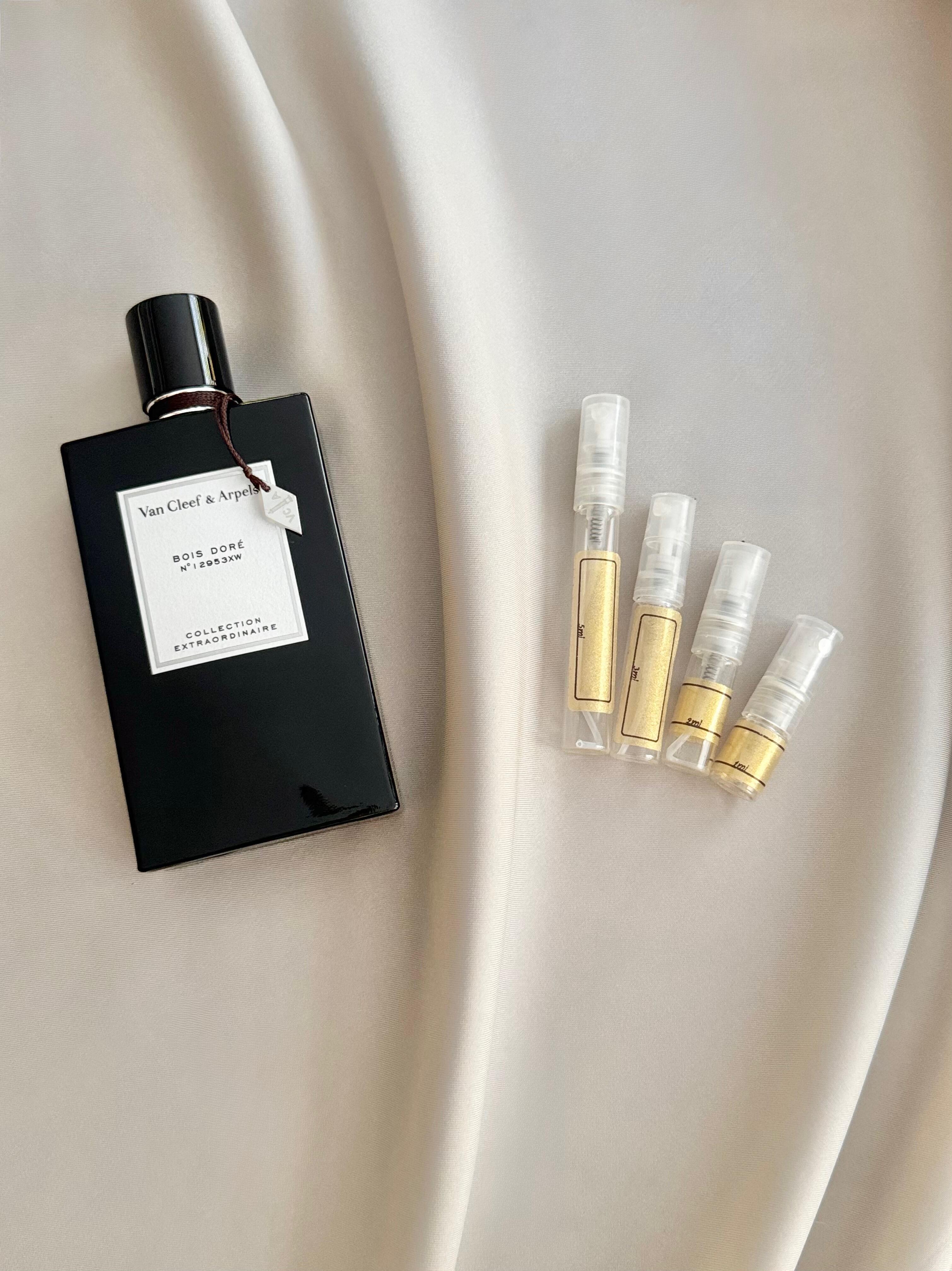 Van Cleef & Arpels Bois Dore with sample bottles