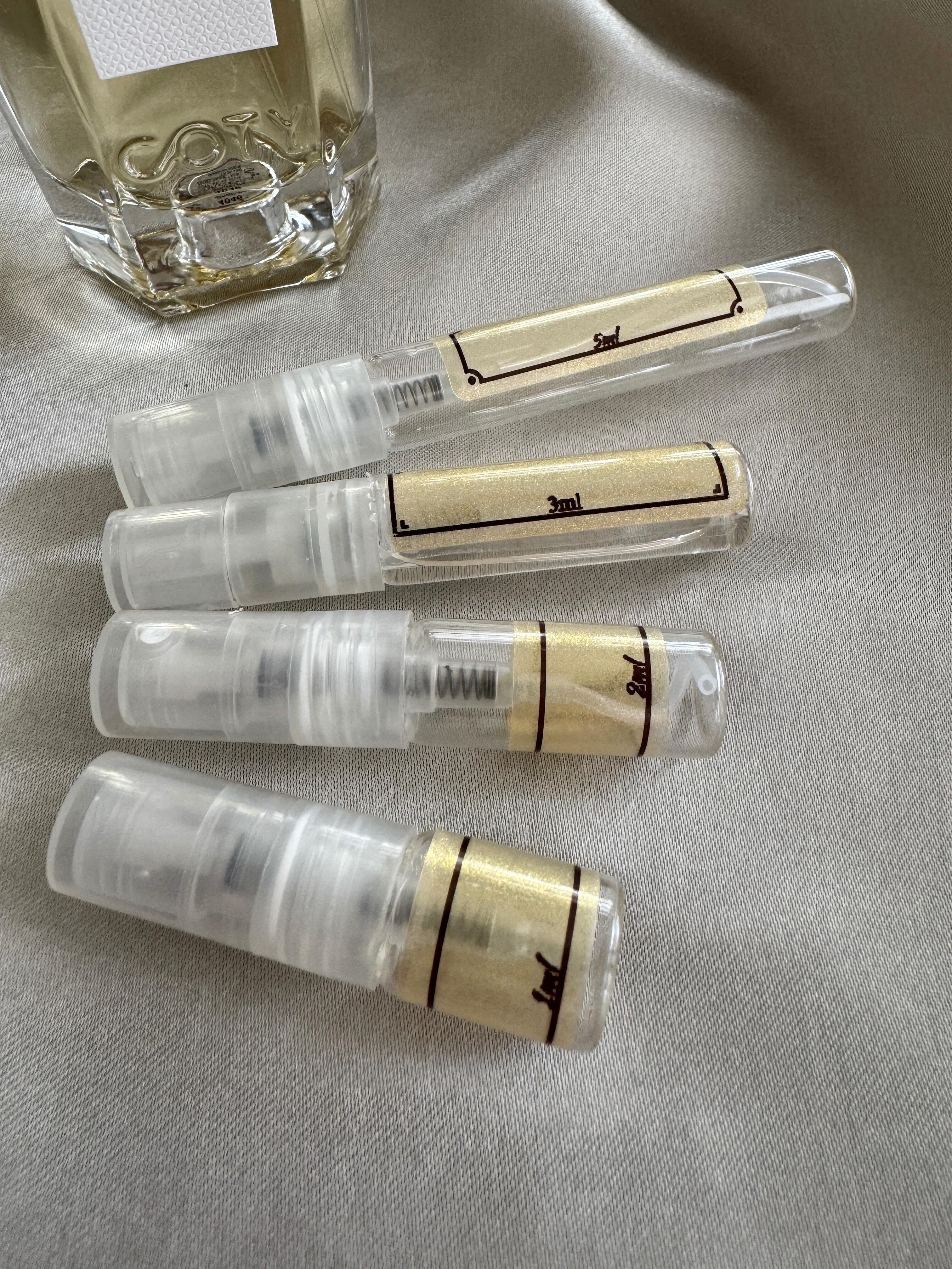 Infiniment Coty Paris Encore Une Fois perfume and samples bottles
