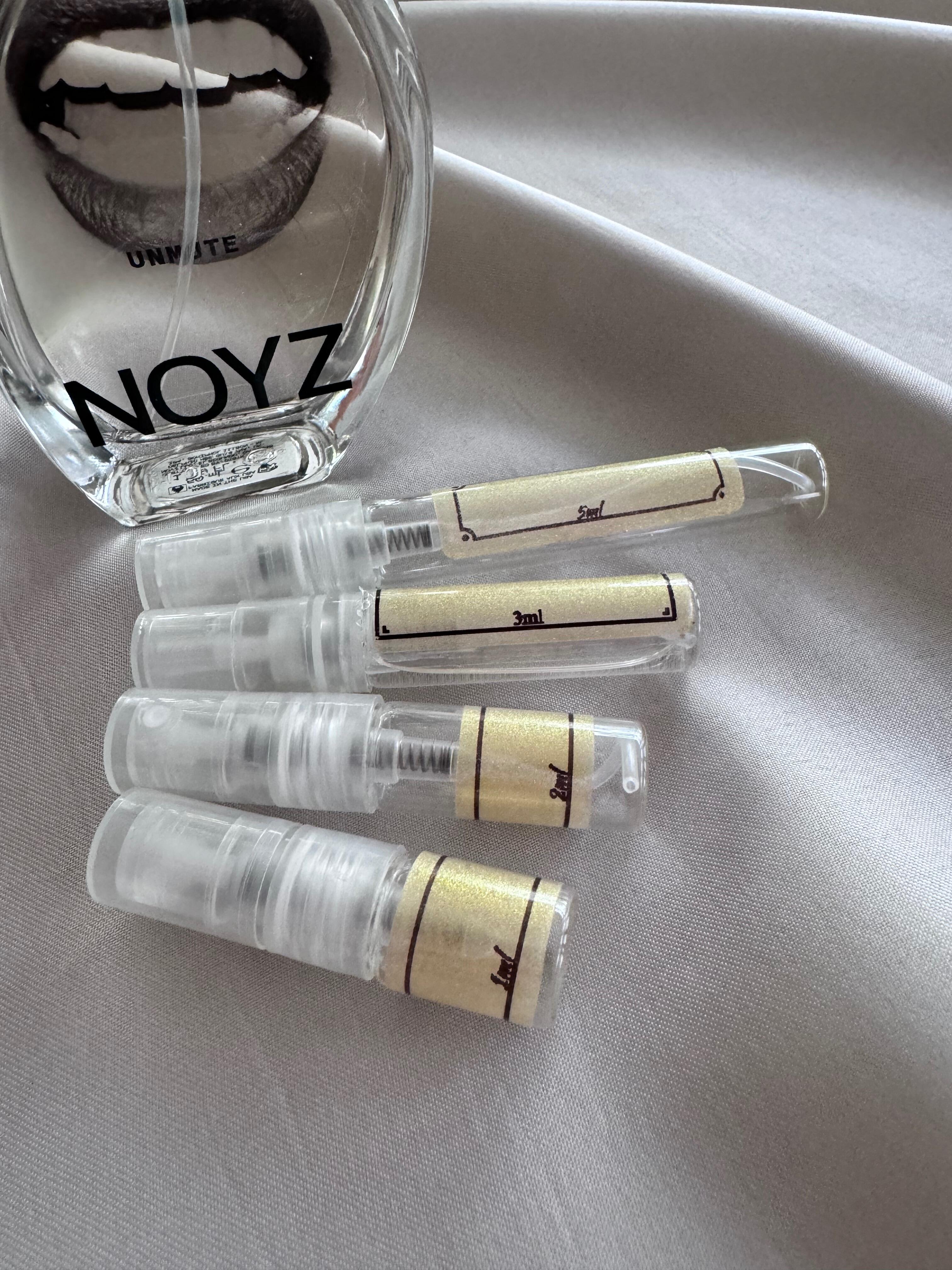 Noyz Unmute perfume with sample bottles