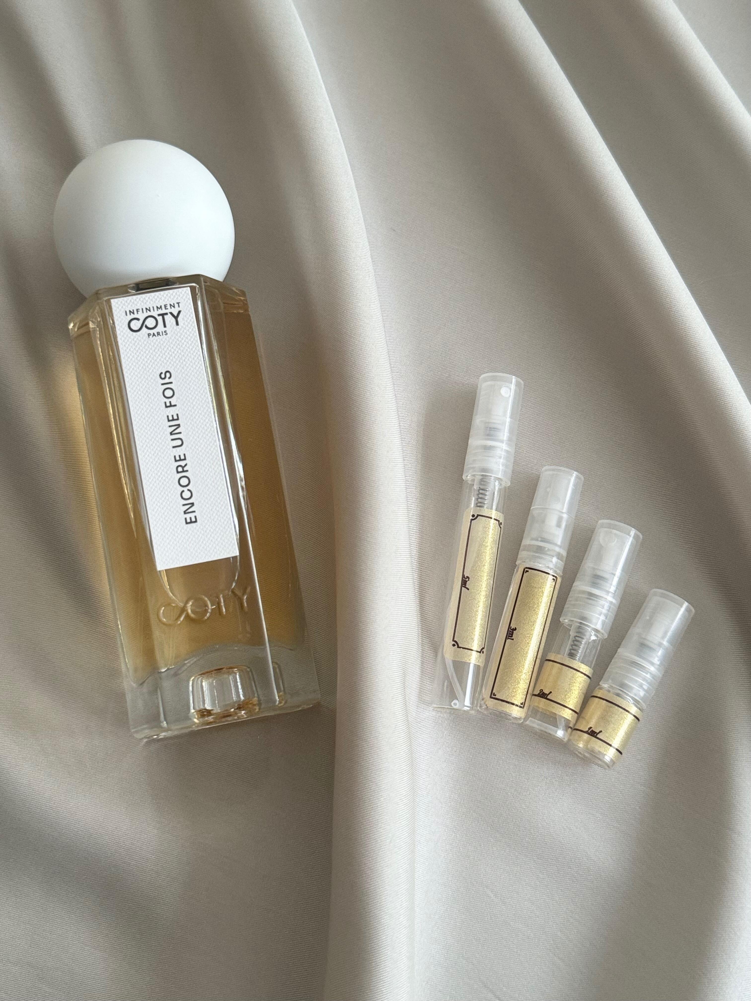 Infiniment Coty Paris Encore Une Fois perfume and samples bottles