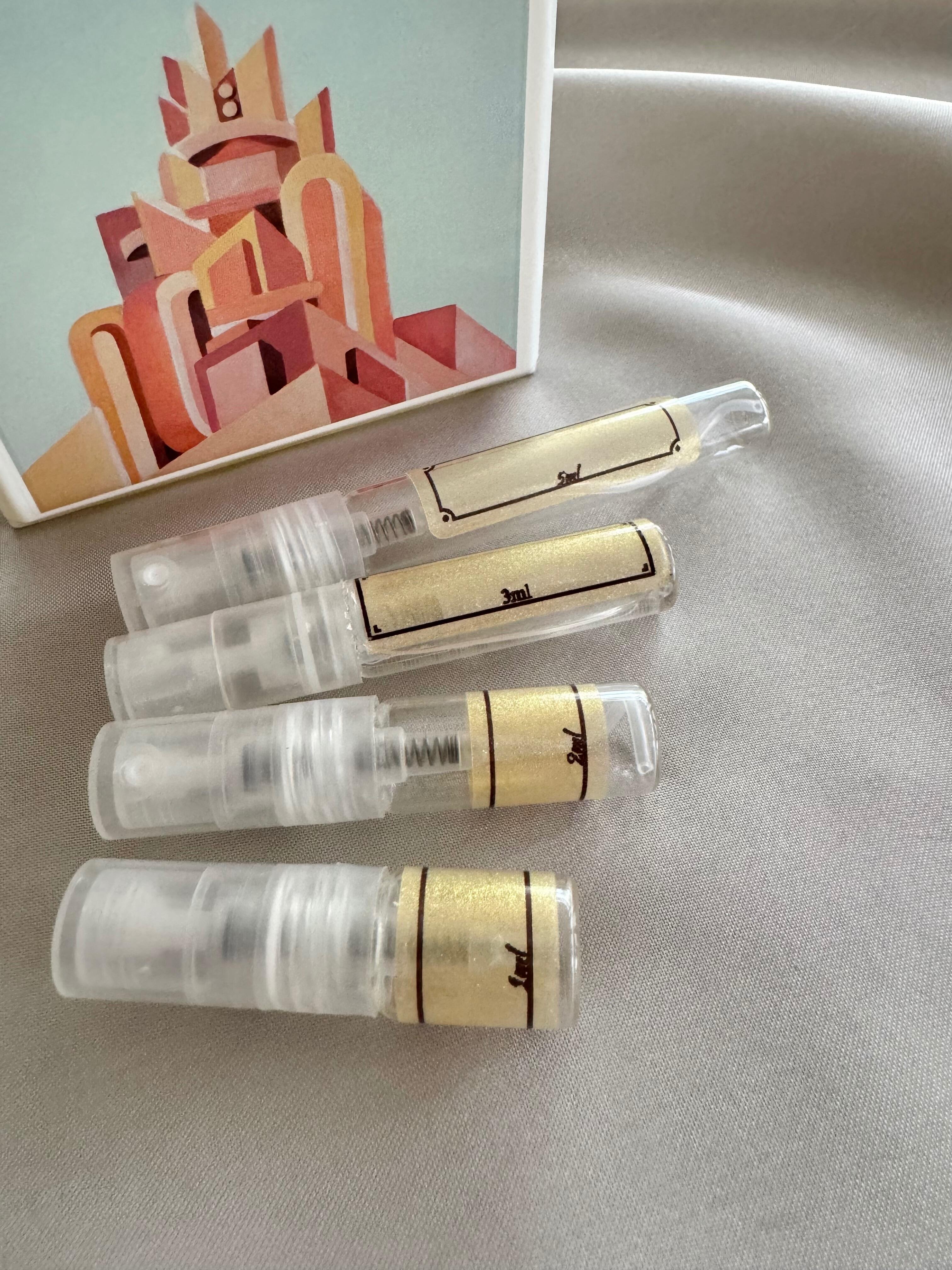 Adamo South of 5th perfume with sample bottles