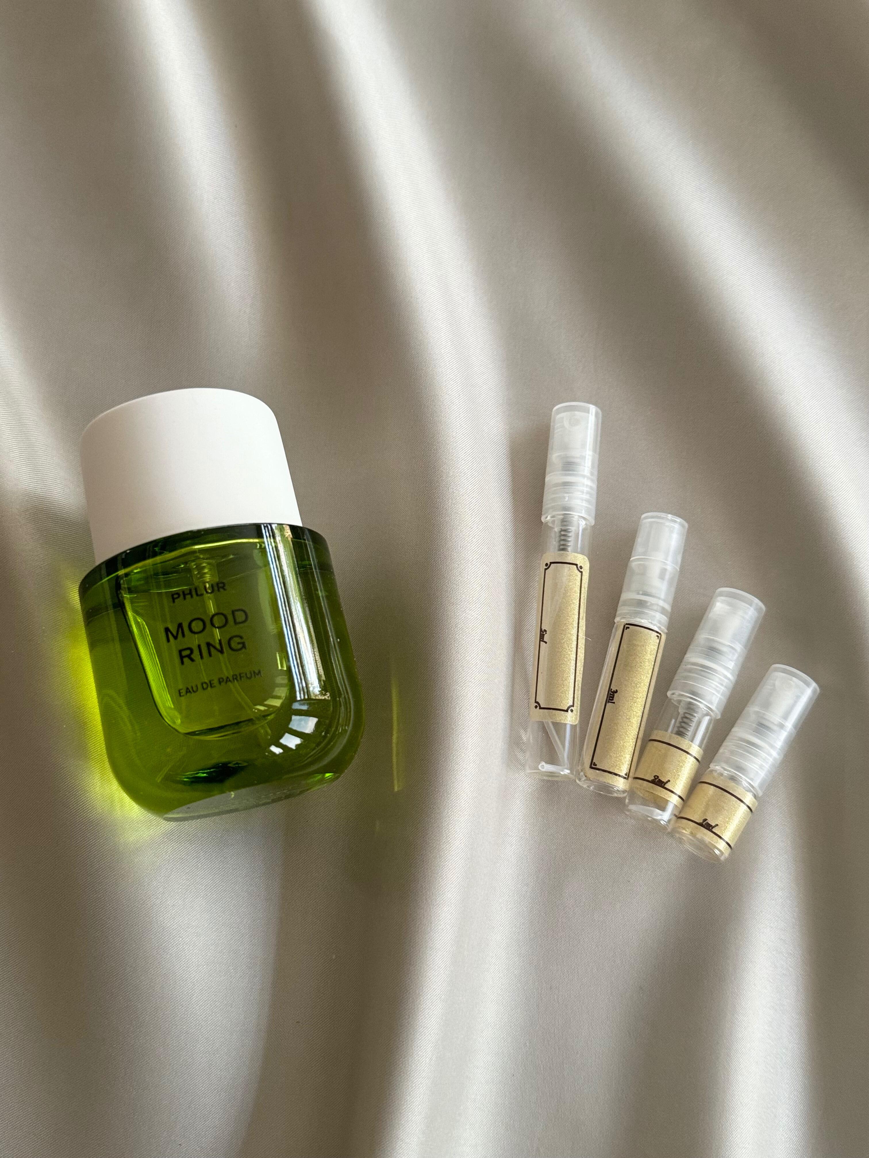 Phlur Mood Ring perfume with sample bottles