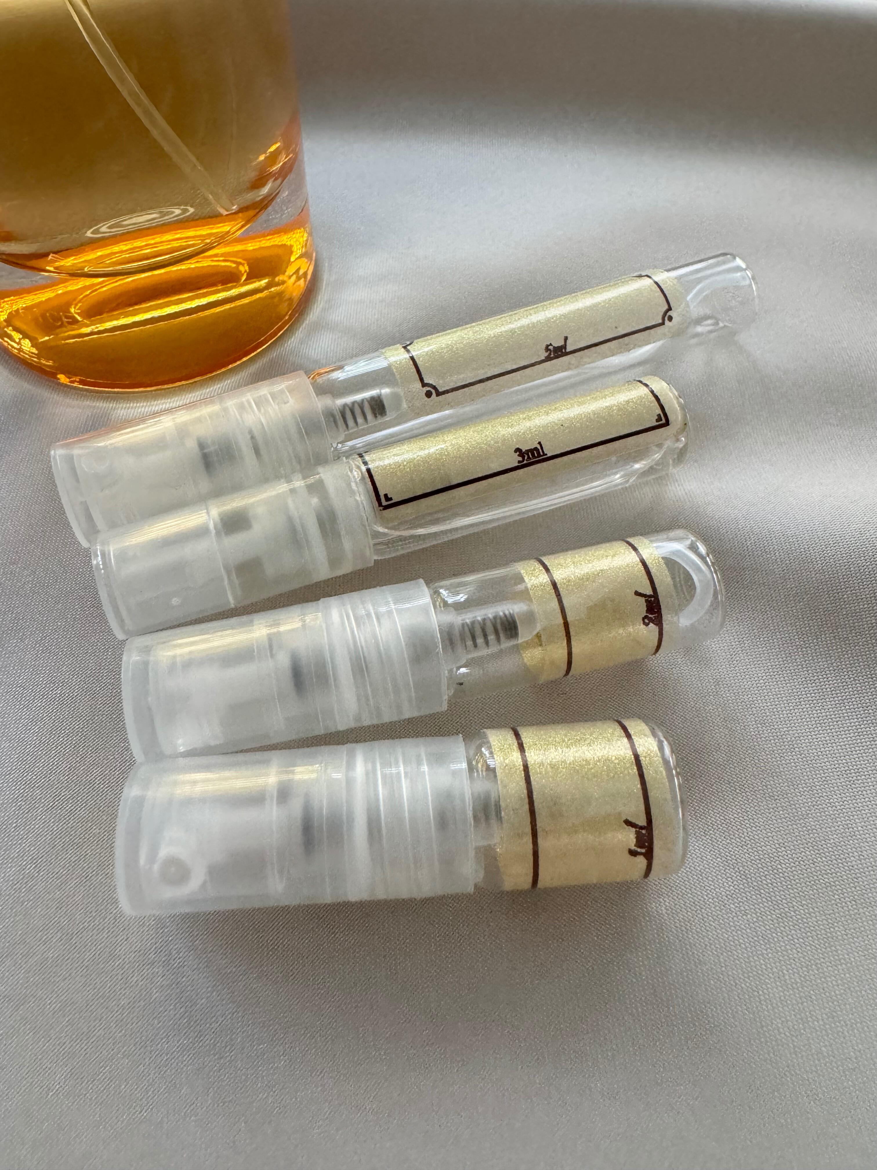 Prada Candy perfume with sample bottles