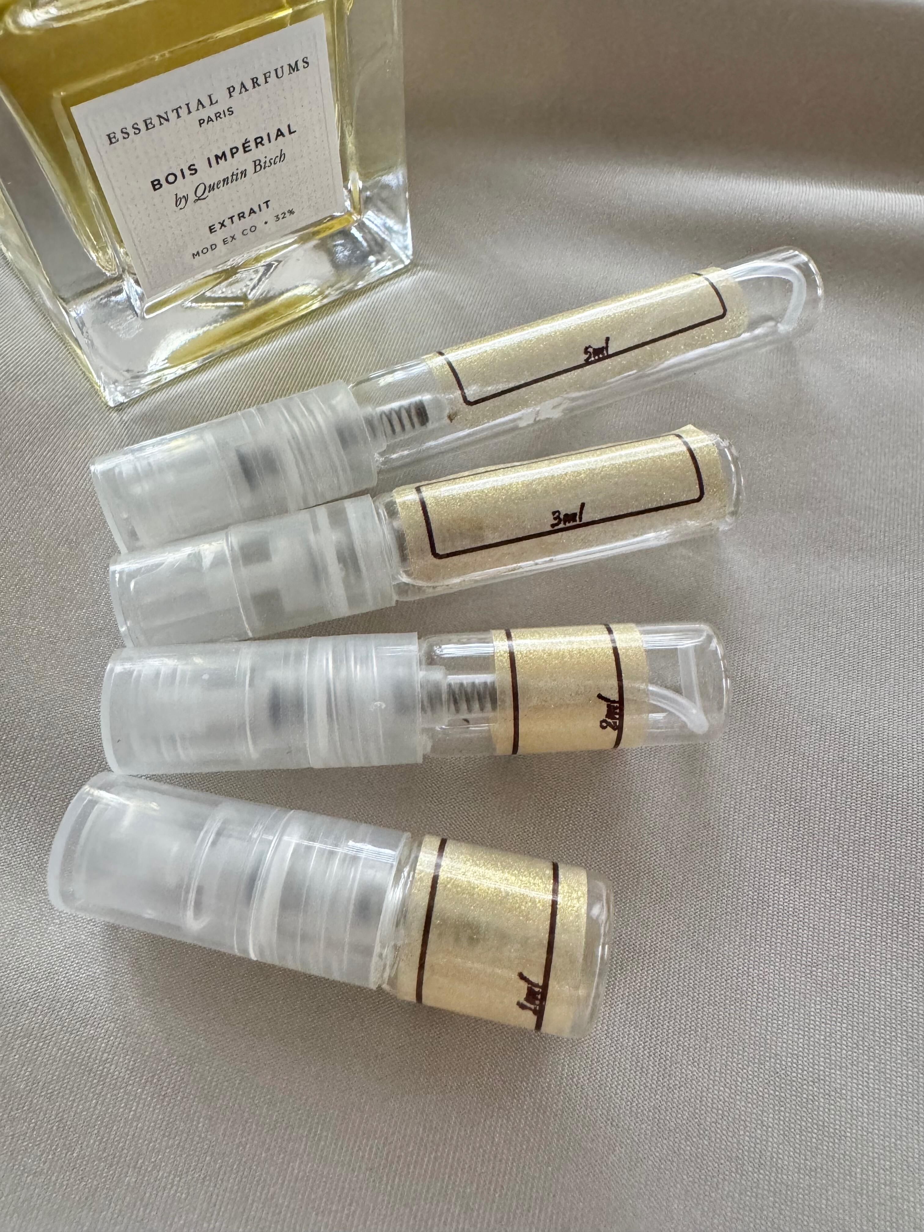 Essential Parfums Bois Imperiale Extrait perfume with sample bottles