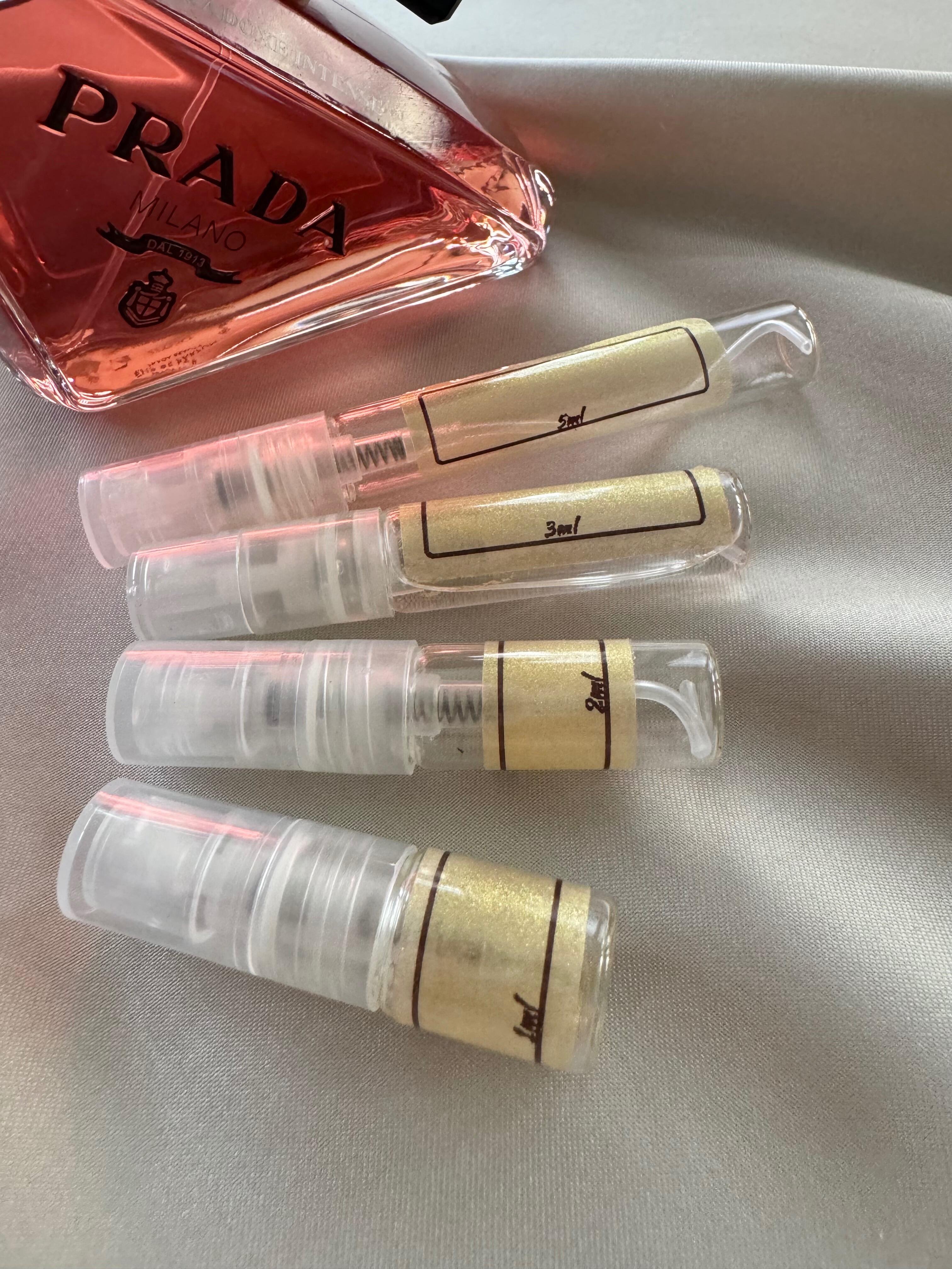 Prada Paradoxe Intense perfume with sample bottles