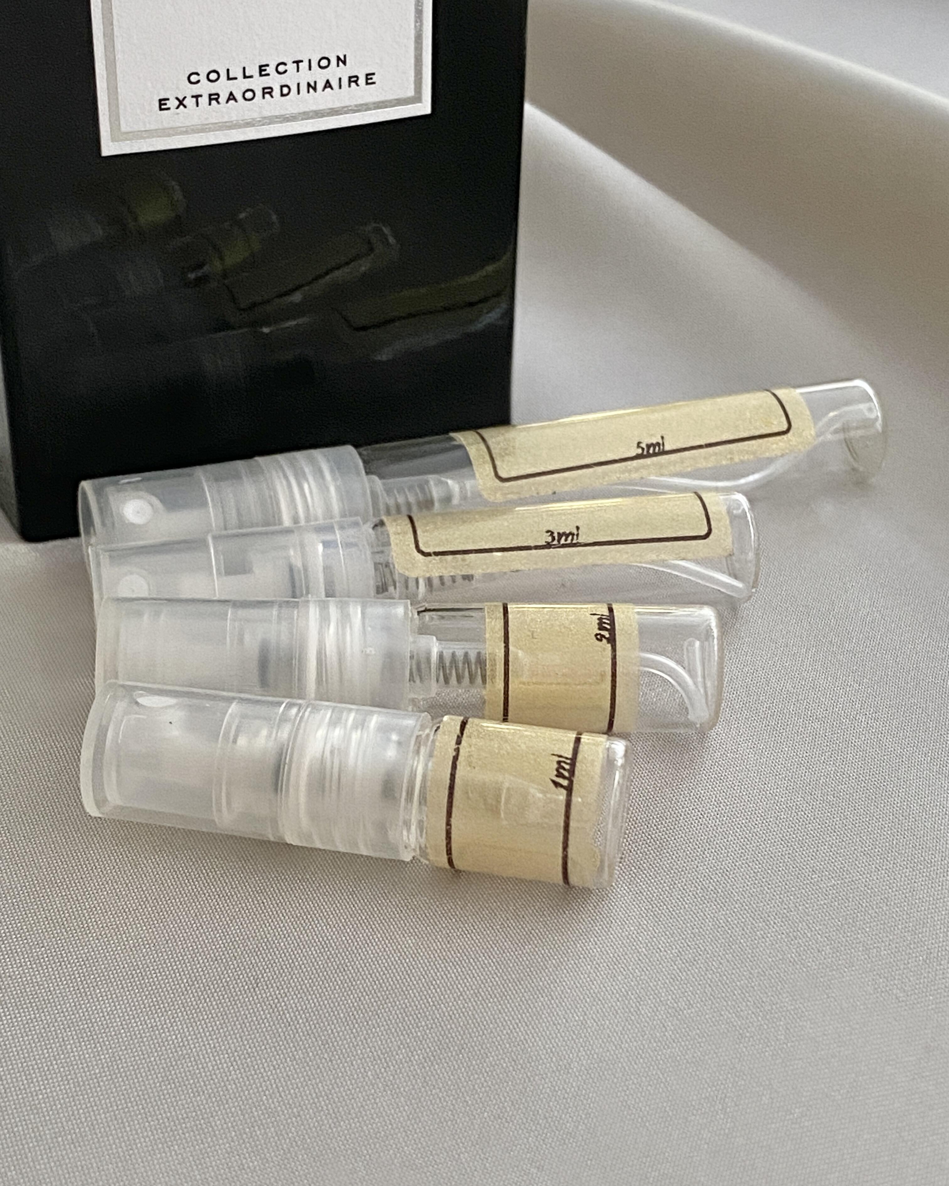 Van Cleef & Arpels Bois Dore and sample bottles