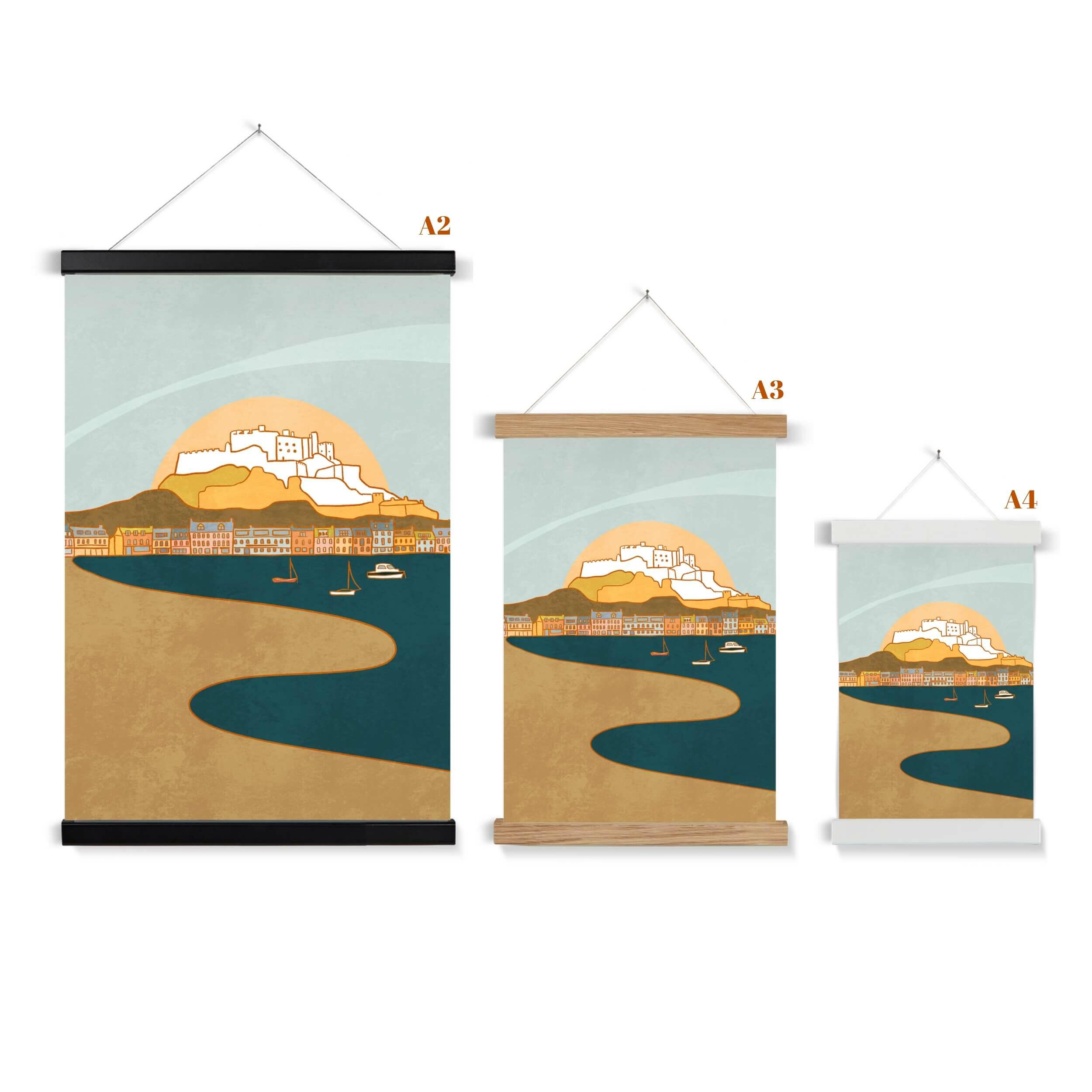 Three sizes and colour choices of wooden wall hanger side by side with Gorey Castle print.
