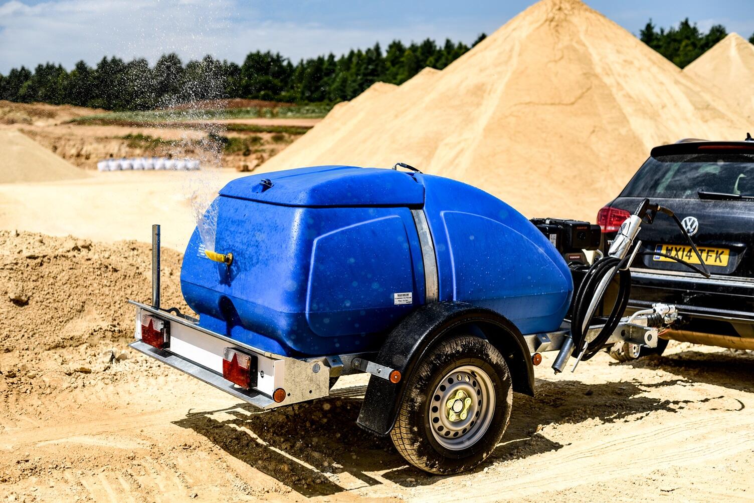 Dust control water bowser with pressure washer