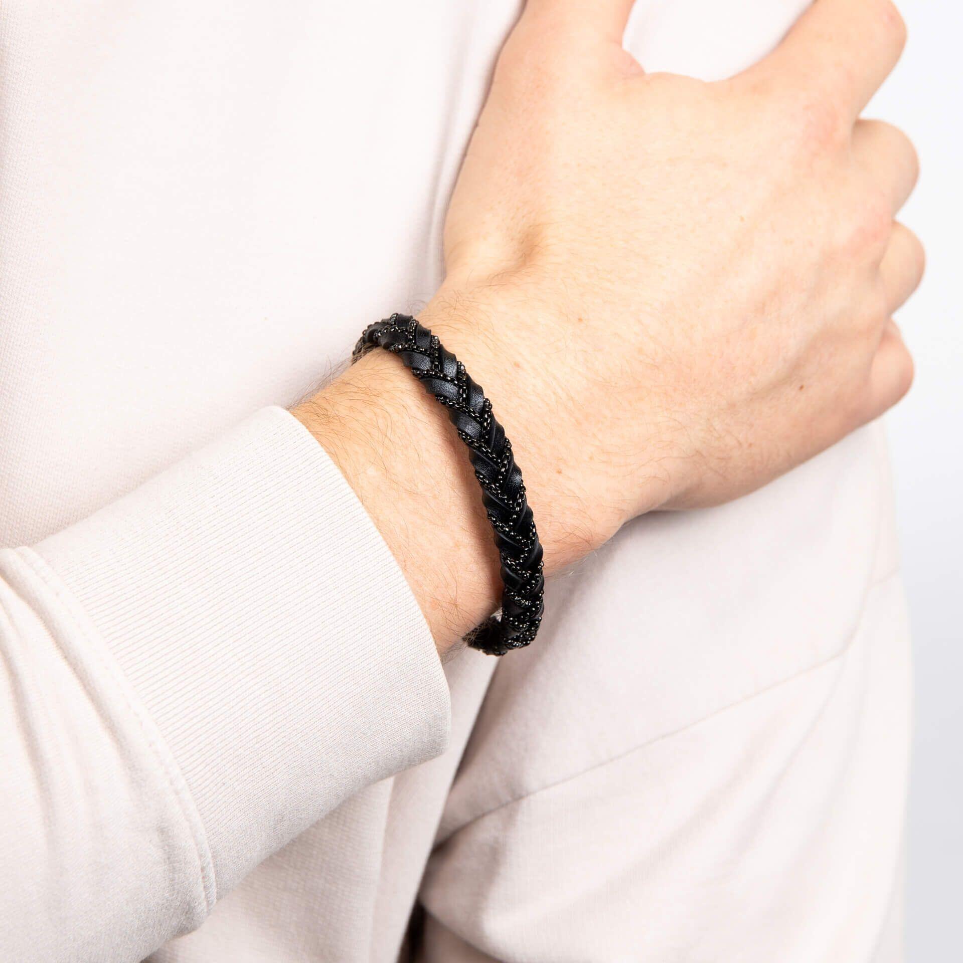 "fredbennett® Chain Plait Black Leather Bracelet – Genuine black braided leather bracelet with a sleek black stainless steel clasp. A bold yet refined men’s accessory, designed for durability, style, and versatility. AnchorCert® certified and presented in luxury suede packaging from Gold and Diamonds."