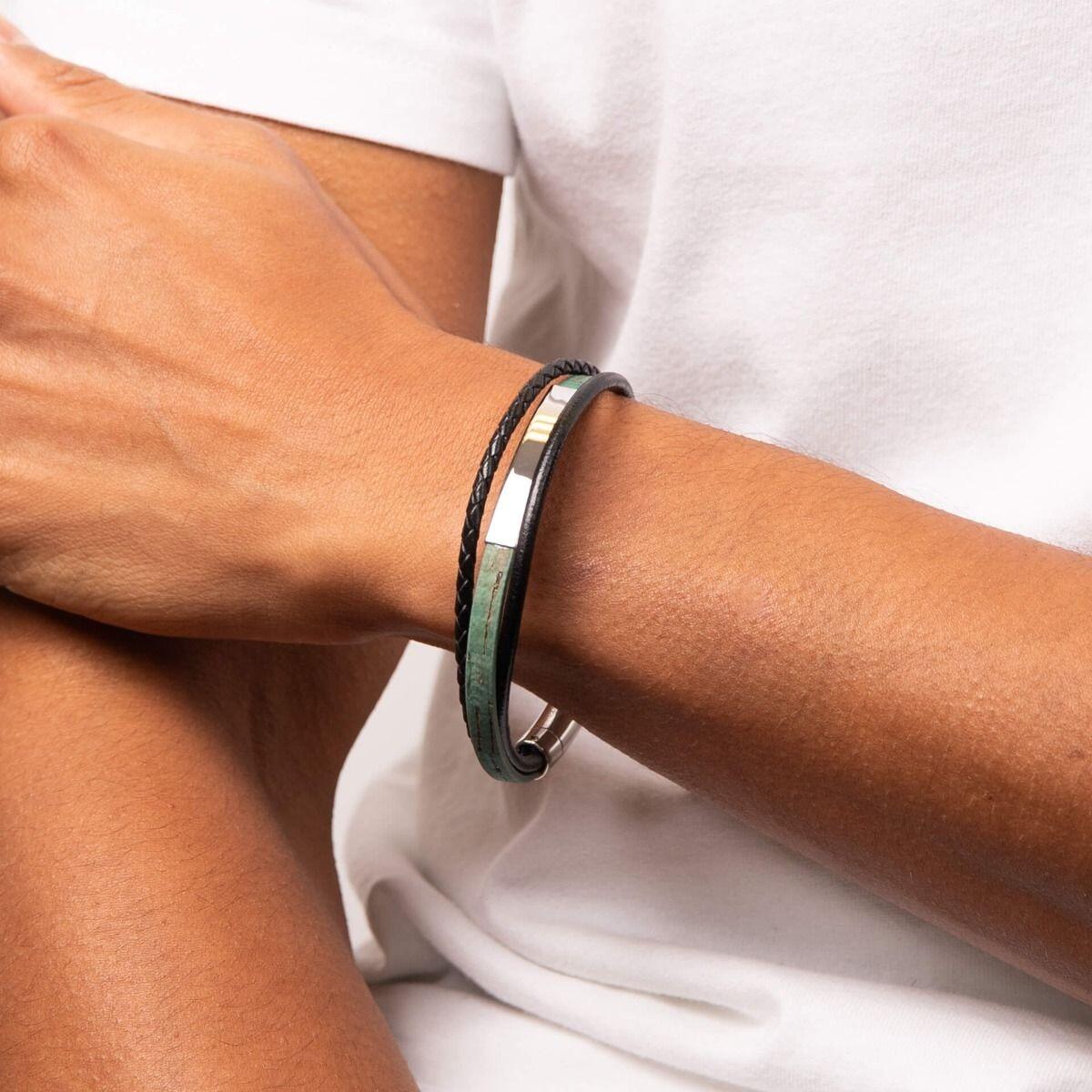 "fredbennett® Multi-Row Green Cork & Black Leather Bracelet – A stylish and eco-friendly men’s bracelet crafted from green cork and black leather, featuring an engravable stainless steel ID bar and a secure double push-button clasp. Free engraving available for custom text or handwritten messages. AnchorCert® certified and presented in luxury suede packaging from Gold and Diamonds."