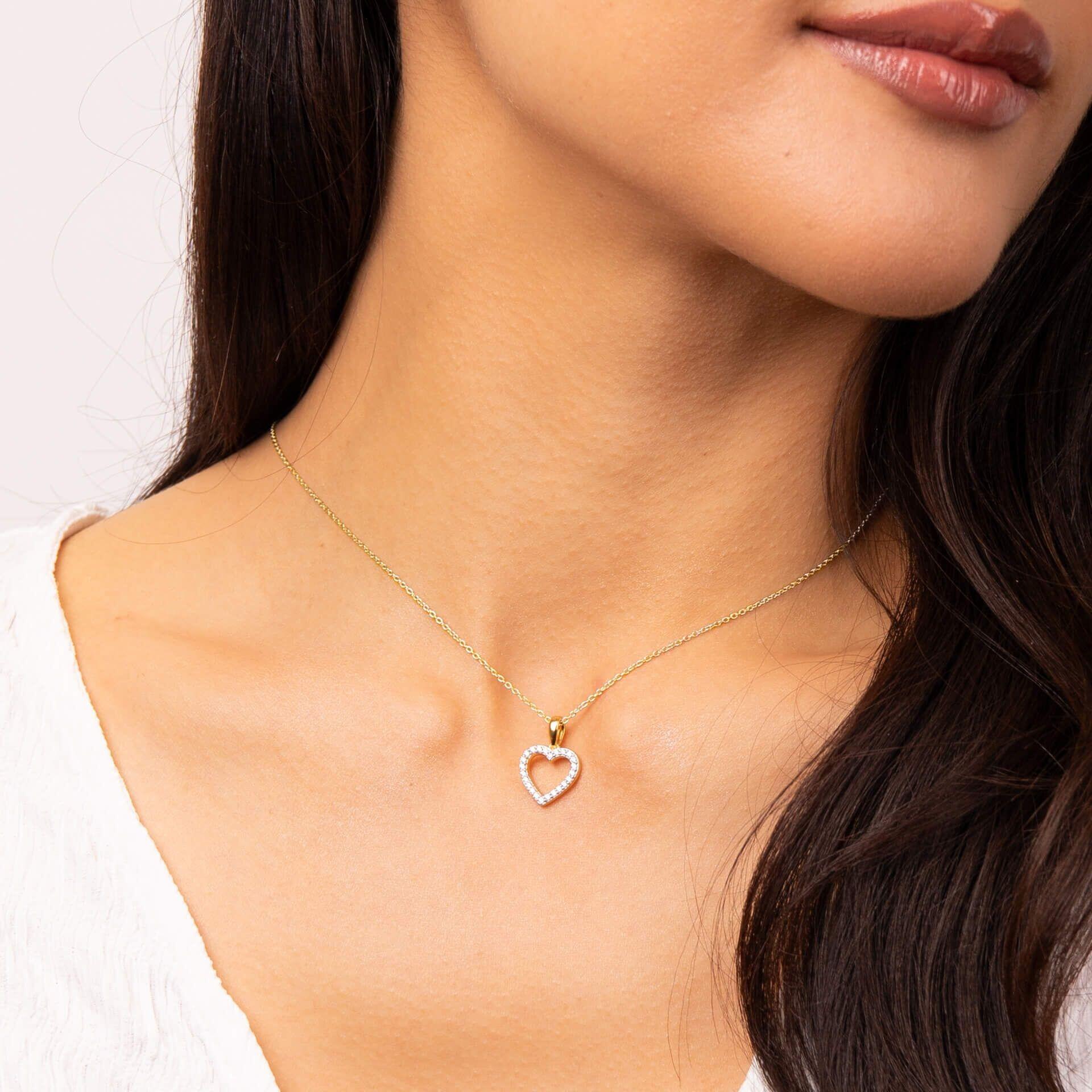 "Diamonfire® 24ct Yellow Gold Plated Pavé Set Heart Pendant with 57-facet zirconia stones, sterling silver triple plated and AnchorCert Pro certified skin safe, in luxury silk packaging."