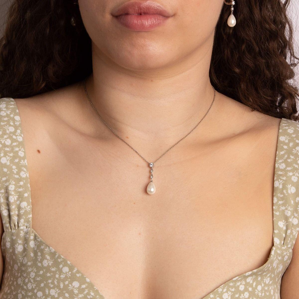 "Diamonfire® Shell Pearl Chain Drop Pendant with 0.13ct zirconia stones and white shell pearl, crafted in triple plated sterling silver, AnchorCert Pro certified skin safe, in luxury silk packaging."