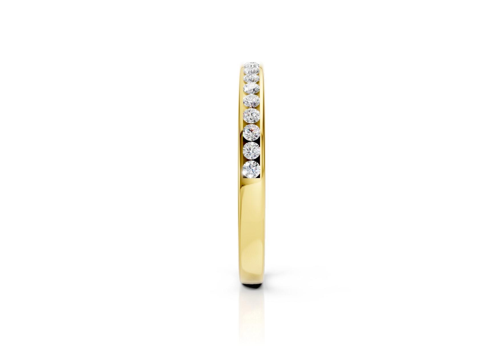 2.2mm channel set diamond wedding band 0.20ct round diamonds 50 percent set in gold platinum and palladium