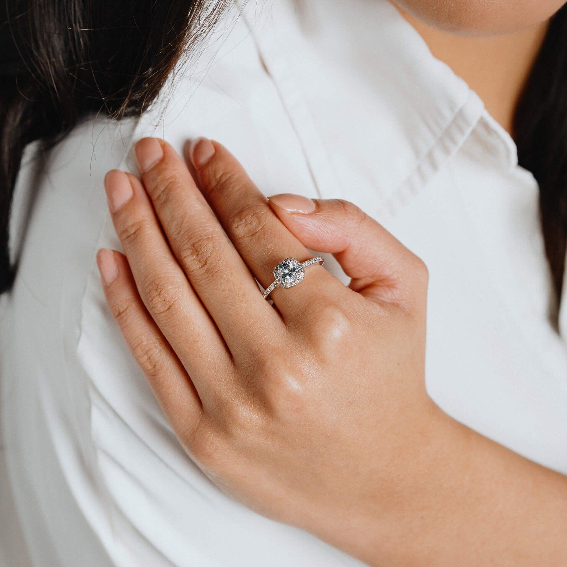 Diamonfire® 1.4ct Square Pave Set Ring with round stone-set halo and shoulders, crafted in triple-plated sterling silver, featuring 57-facet cut zirconia stones, presented in exclusive silk packaging with a luxury gift box and bag.