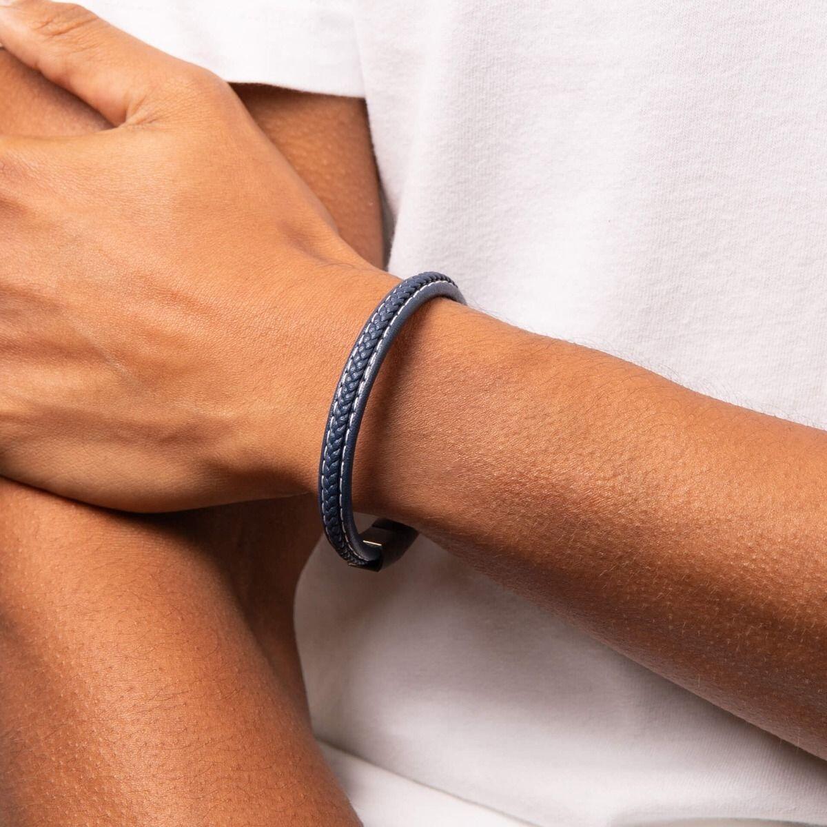"fredbennett® Blue Plaited Leather Bracelet – A stylish men’s bracelet crafted from genuine blue plaited leather, featuring a gunmetal stainless steel clasp. Perfect for everyday wear and stacking. AnchorCert® certified and presented in luxury suede packaging from Gold and Diamonds."
