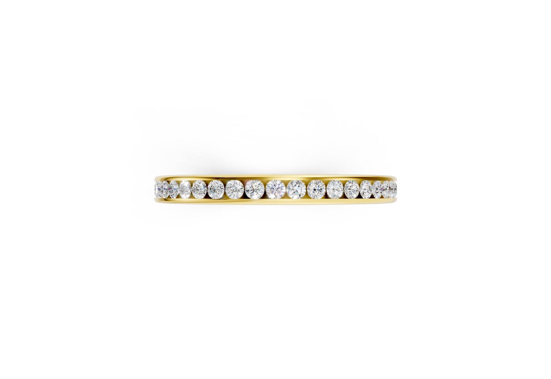 2.2mm channel set diamond wedding band 0.20ct round diamonds 50 percent set in gold platinum and palladium