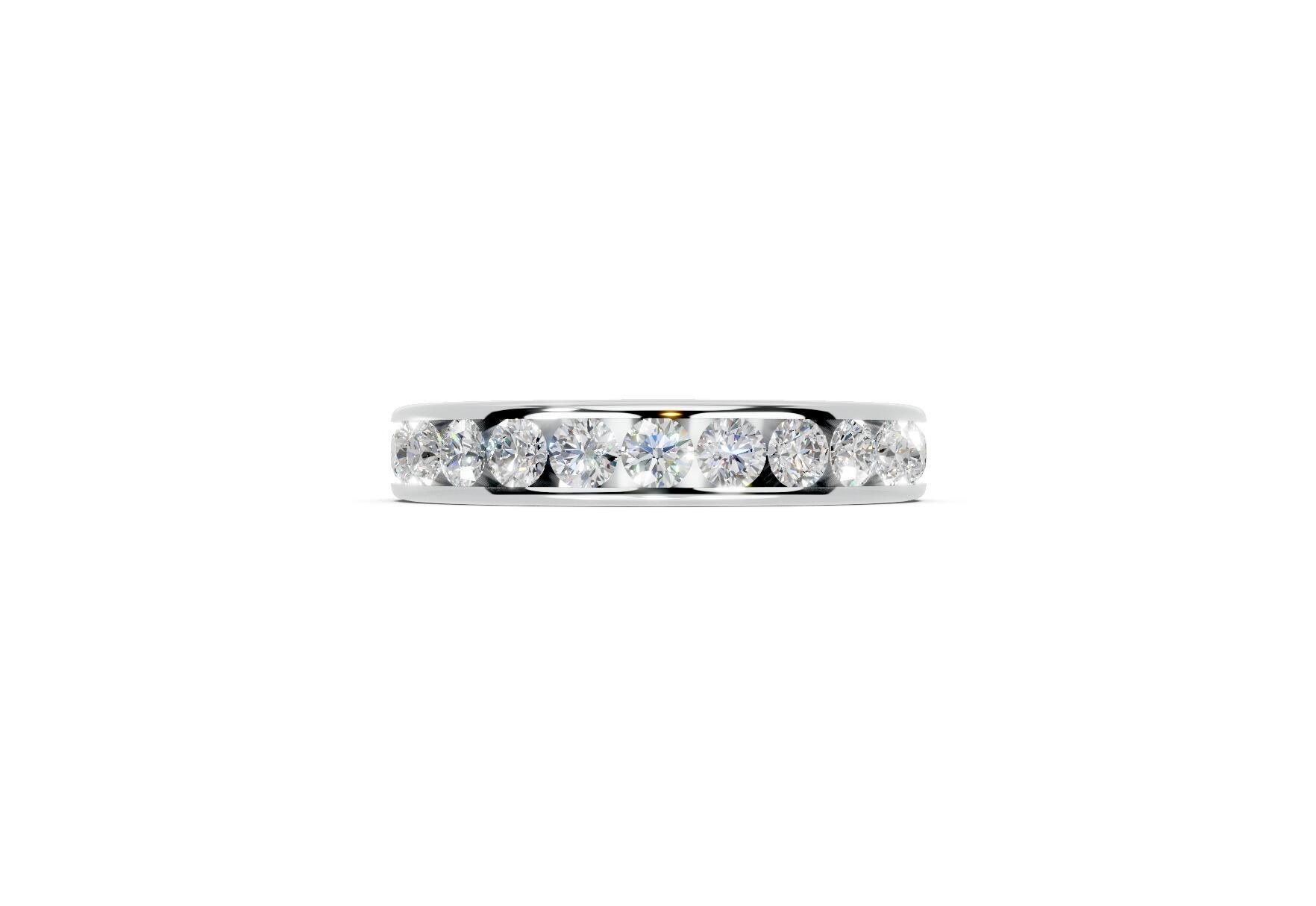 3.7mm channel set diamond wedding ring with 0.75ct round diamonds, 50% set for added sparkle. Available in gold, platinum and palladium. Natural G/VS or lab D/VVS1 diamonds. Free home consultations.