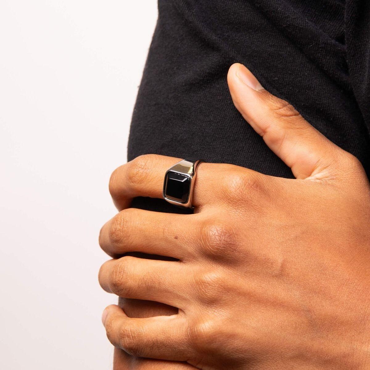 "Stainless Steel Polished Signet Ring with Black Onyx by fredbennett®, AnchorCert Pro certified skin safe, presented in a branded luxury suede pouch."