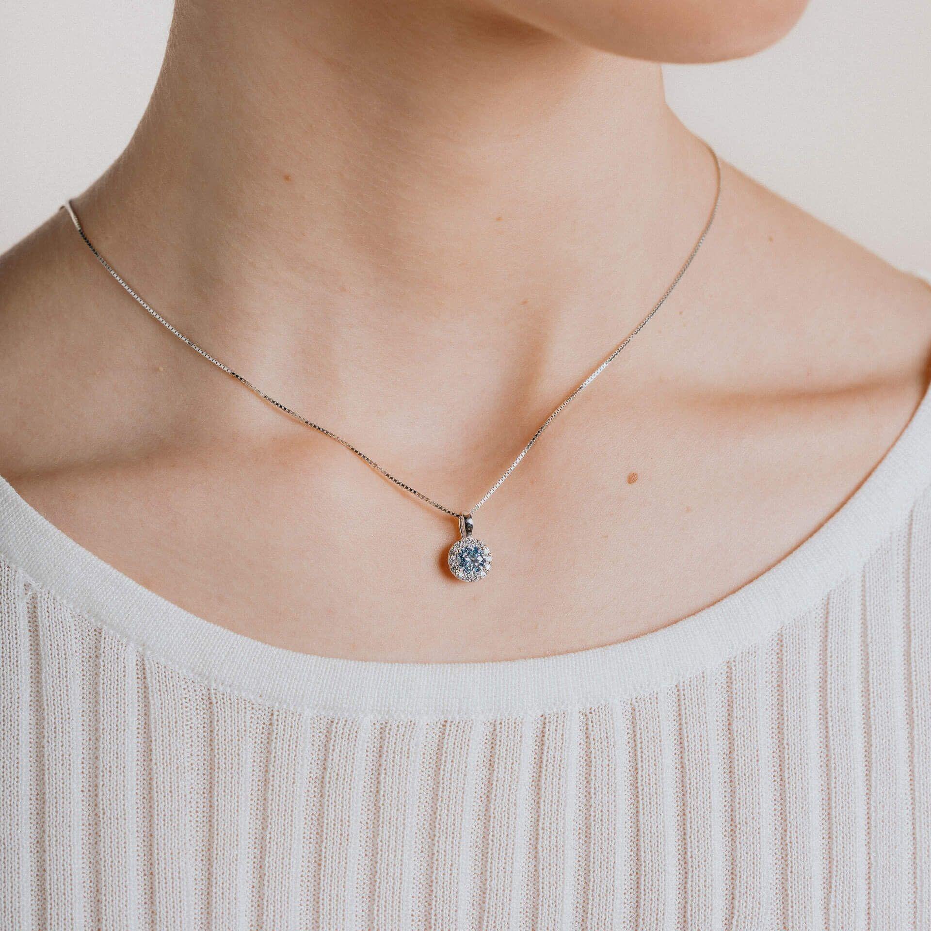 "Diamonfire® Pastel Blue Pavé Zirconia Pendant with 57-facet centre stone, triple plated in rhodium, palladium and platinum, AnchorCert Pro certified skin safe, presented in luxury silk packaging with gift bag—perfect for wedding day sparkle."