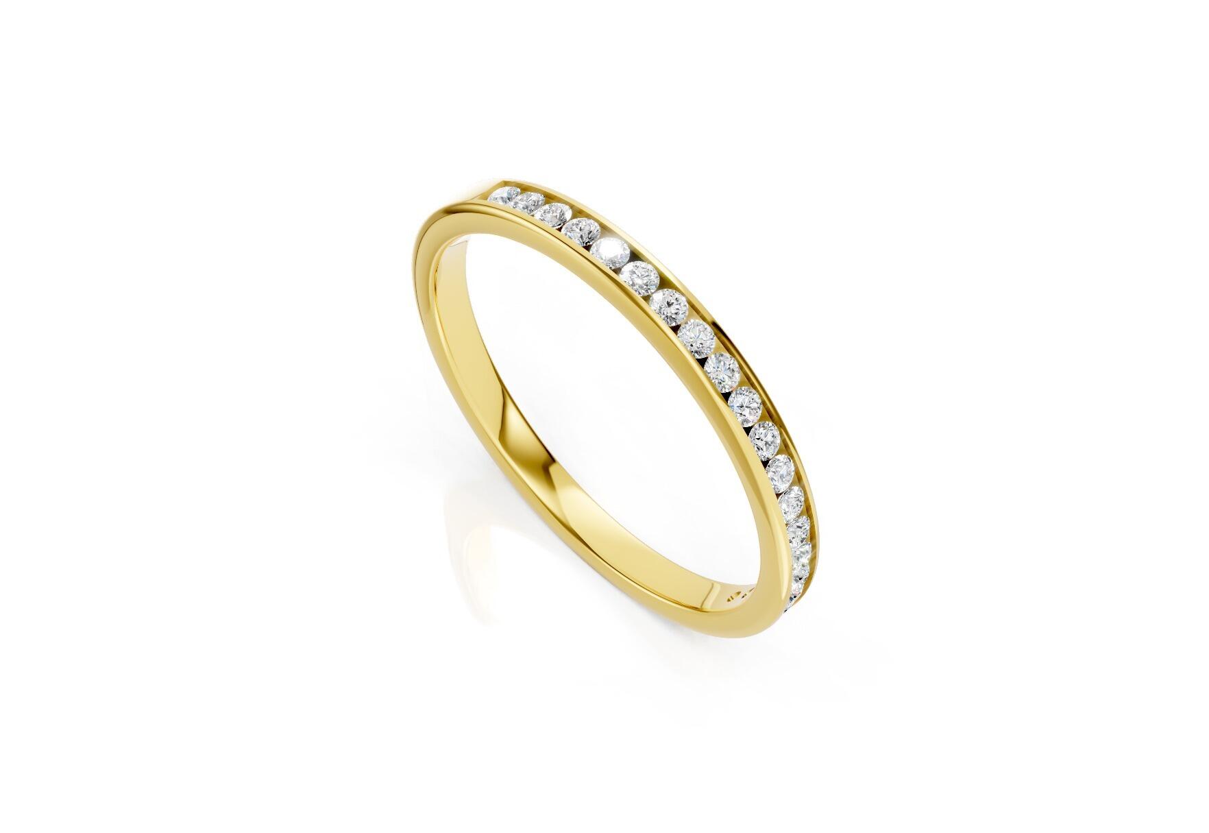 2mm channel set diamond wedding band 0.15ct round diamonds 50 percent set in gold platinum and palladium