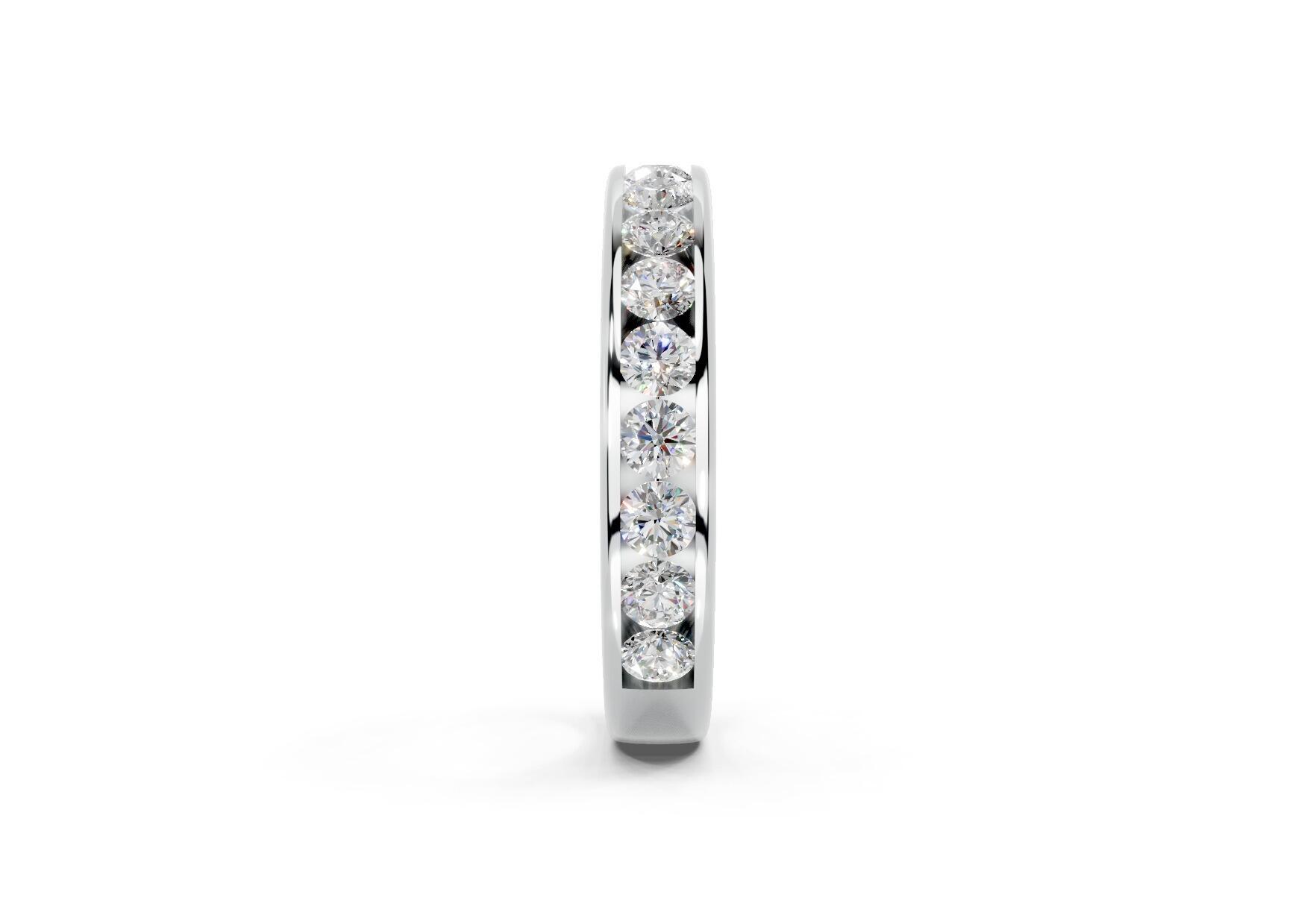 3.7mm channel set diamond wedding ring with 0.75ct round diamonds, 50% set for added sparkle. Available in gold, platinum and palladium. Natural G/VS or lab D/VVS1 diamonds. Free home consultations.