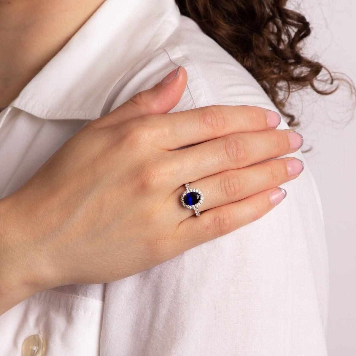 Sapphire Blue Oval Diamonfire® Ring with Clear Pave Surround, 2.57ct
