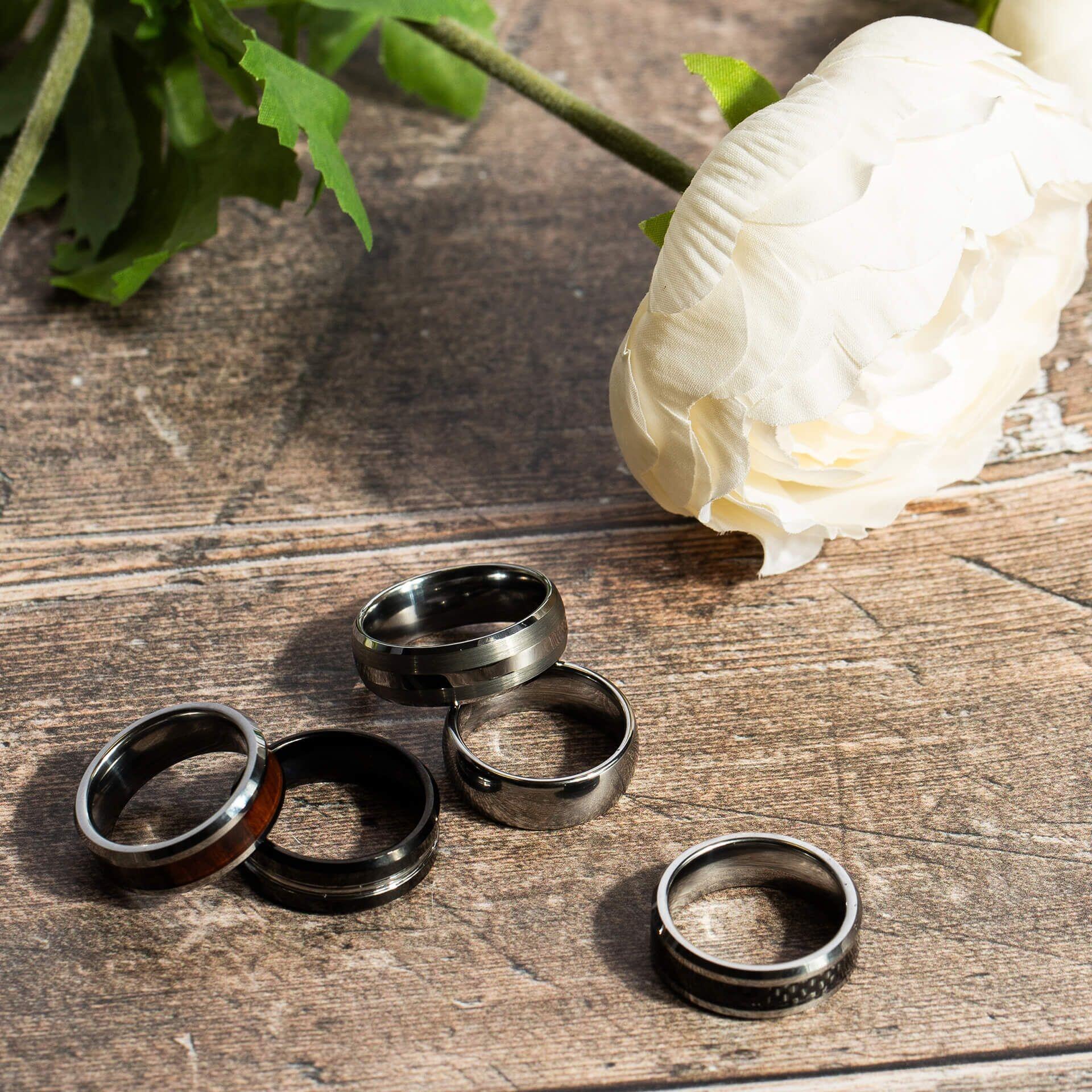 "6mm Stainless Steel Ring with hammered texture and brushed finish, AnchorCert Pro certified skin safe, presented in a branded suede pouch, by fredbennett®."