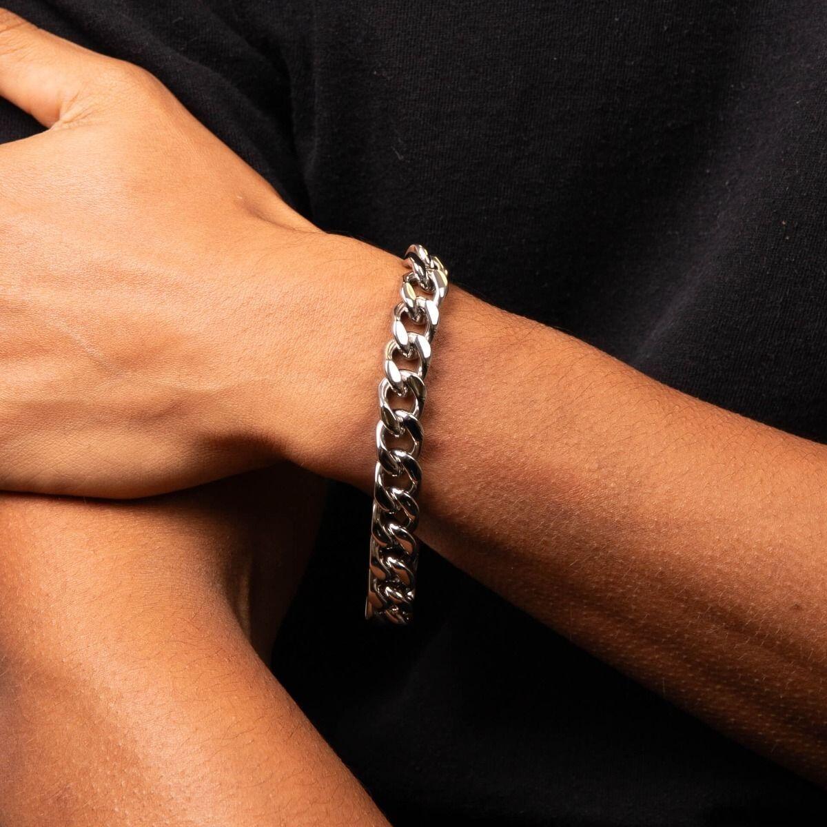 "fredbennett® Heavyweight Curb Chain Bracelet – A bold and symbolic men’s bracelet crafted from high-quality stainless steel with interlocking curb links that represent unity and strength. 22cm in length, perfect for stacking or pairing with the matching necklace. AnchorCert® certified and presented in luxury suede packaging from Gold and Diamonds."