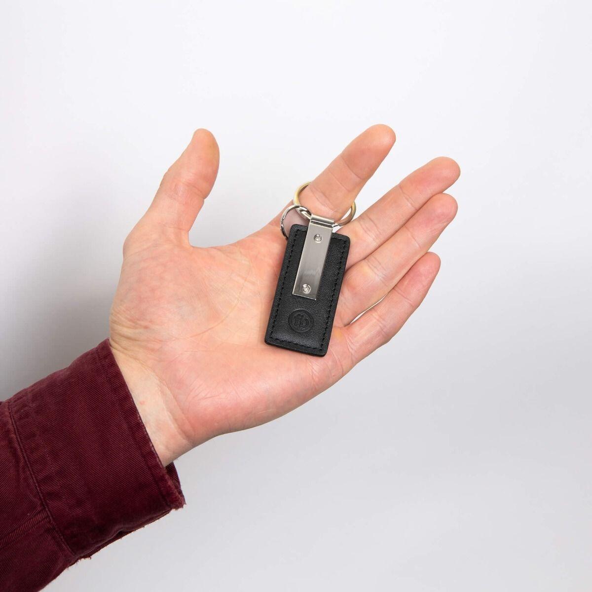 "fredbennett® Black Leather Keychain with stainless steel engravable tag – personalise the leather, the metal, or both for a sleek and sentimental accessory. Free engraving included. Available at Gold and Diamonds."