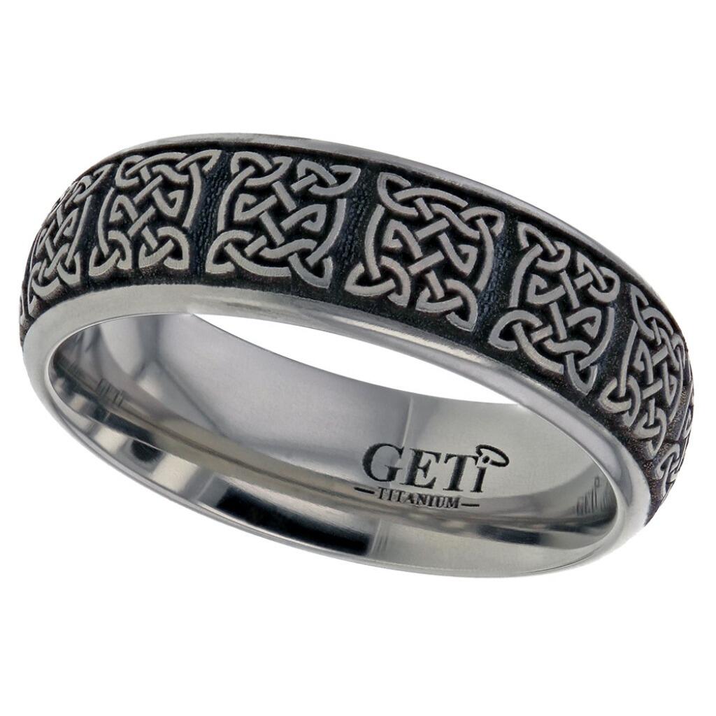 Traditional court shaped Geti titanium wedding band with brushed finish and laser engraved Celtic pattern by Gold and Diamonds