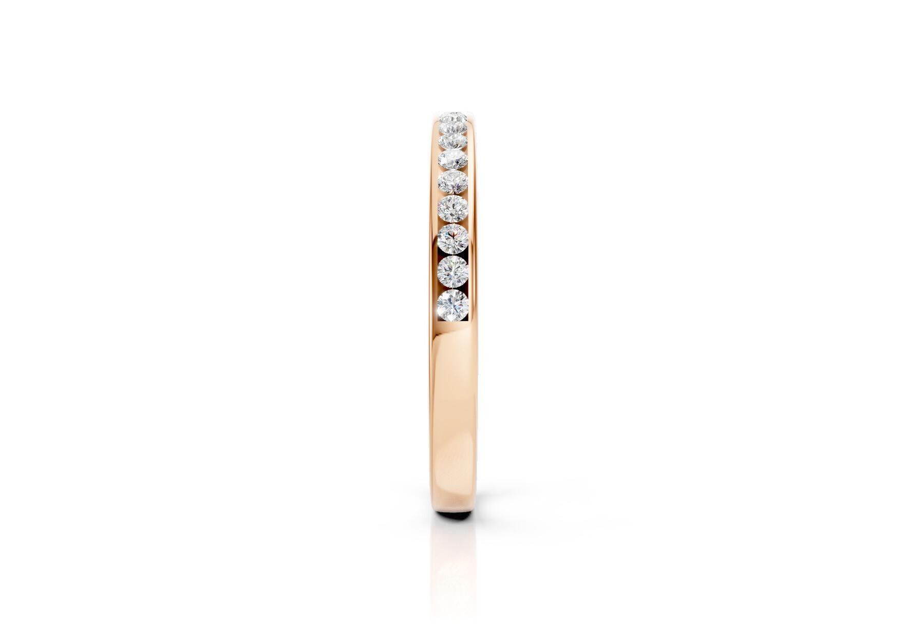 2.2mm channel set diamond wedding band 0.20ct round diamonds 50 percent set in gold platinum and palladium