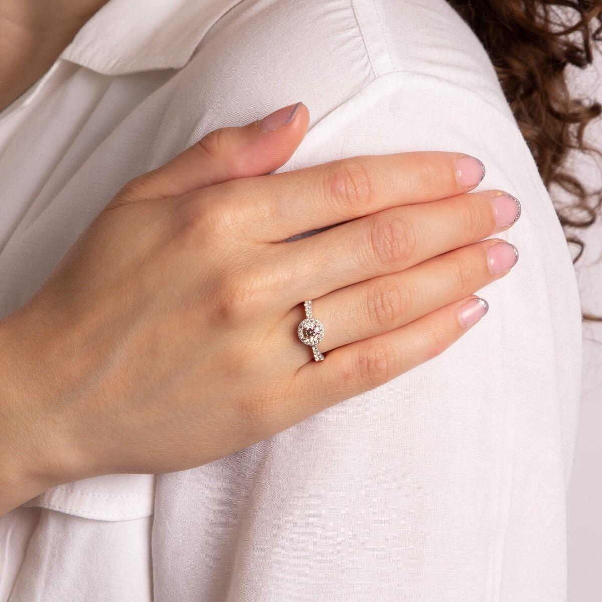 Diamonfire® 1.25ct Halo & Pave Set Shoulder Ring with pink zirconia centre stone, crafted in triple-plated sterling silver, featuring 57-facet cut zirconia stones, presented in exclusive silk packaging with a luxury gift box and bag.